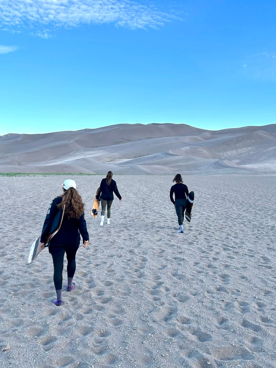 Sand Sledding at Great Sand Dunes National Park curated by Danielle Brinckman