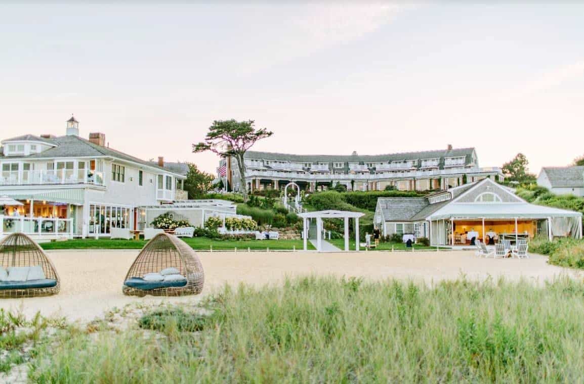 A coastal beach resort with green grass in late afternoon