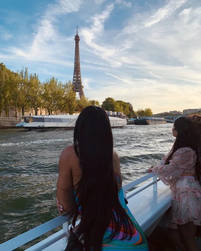 travel advisor boats past Eiffel Tower