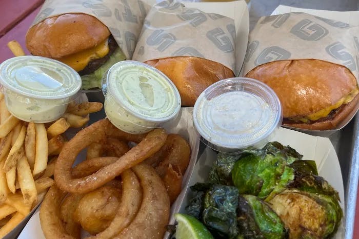 Burgers, fries, onion rings and brussels sprouts at Gott's Roadside restaurant.
