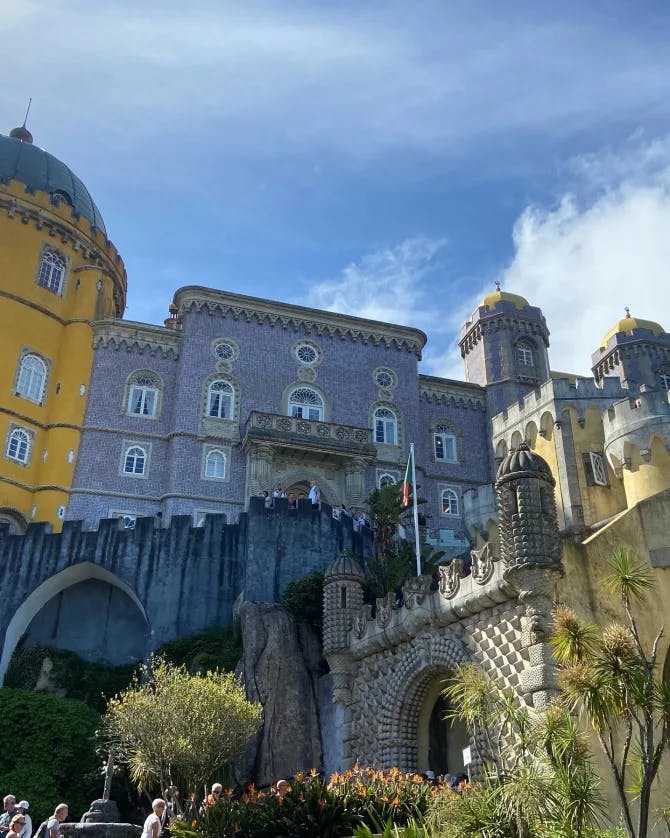 Beautiful view of National Palace of Pena with its purple and yellow buildings