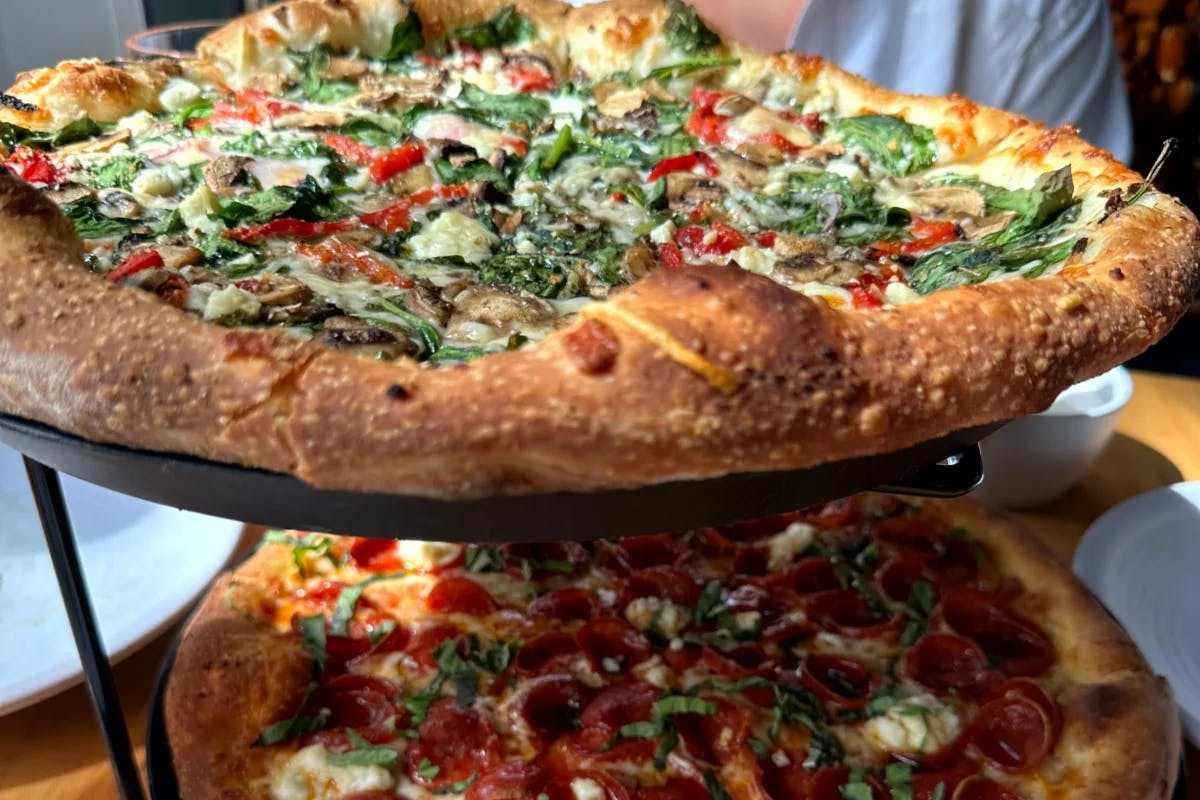 pizzas-served-chicago-travel-guide