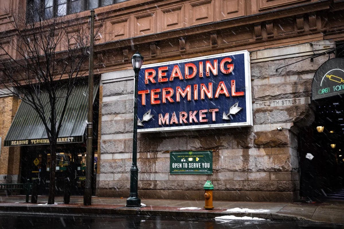 A building with board saying "Reading Terminal Market".