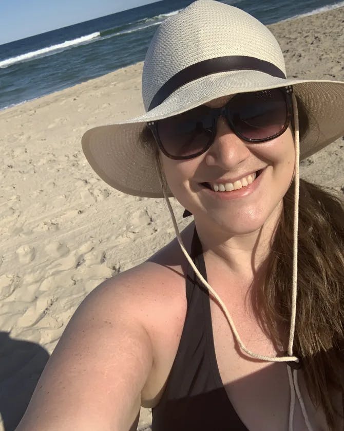 selfie on beach in hat