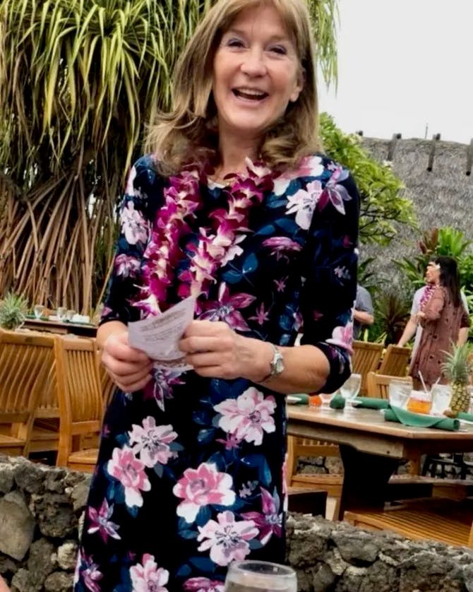 Woman in floral dress in Hawaii. 
