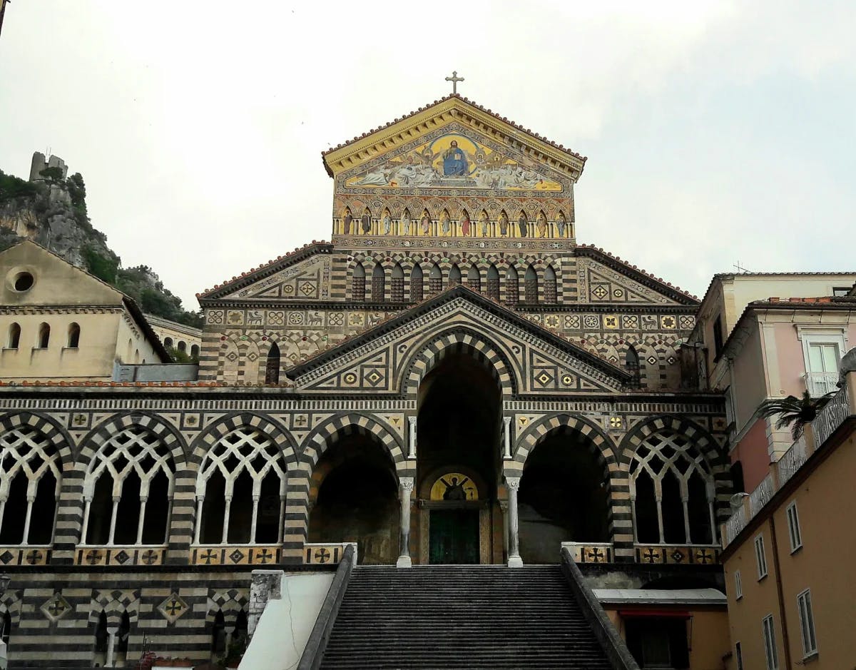 The intricate facade of an old religious building in Amalfi