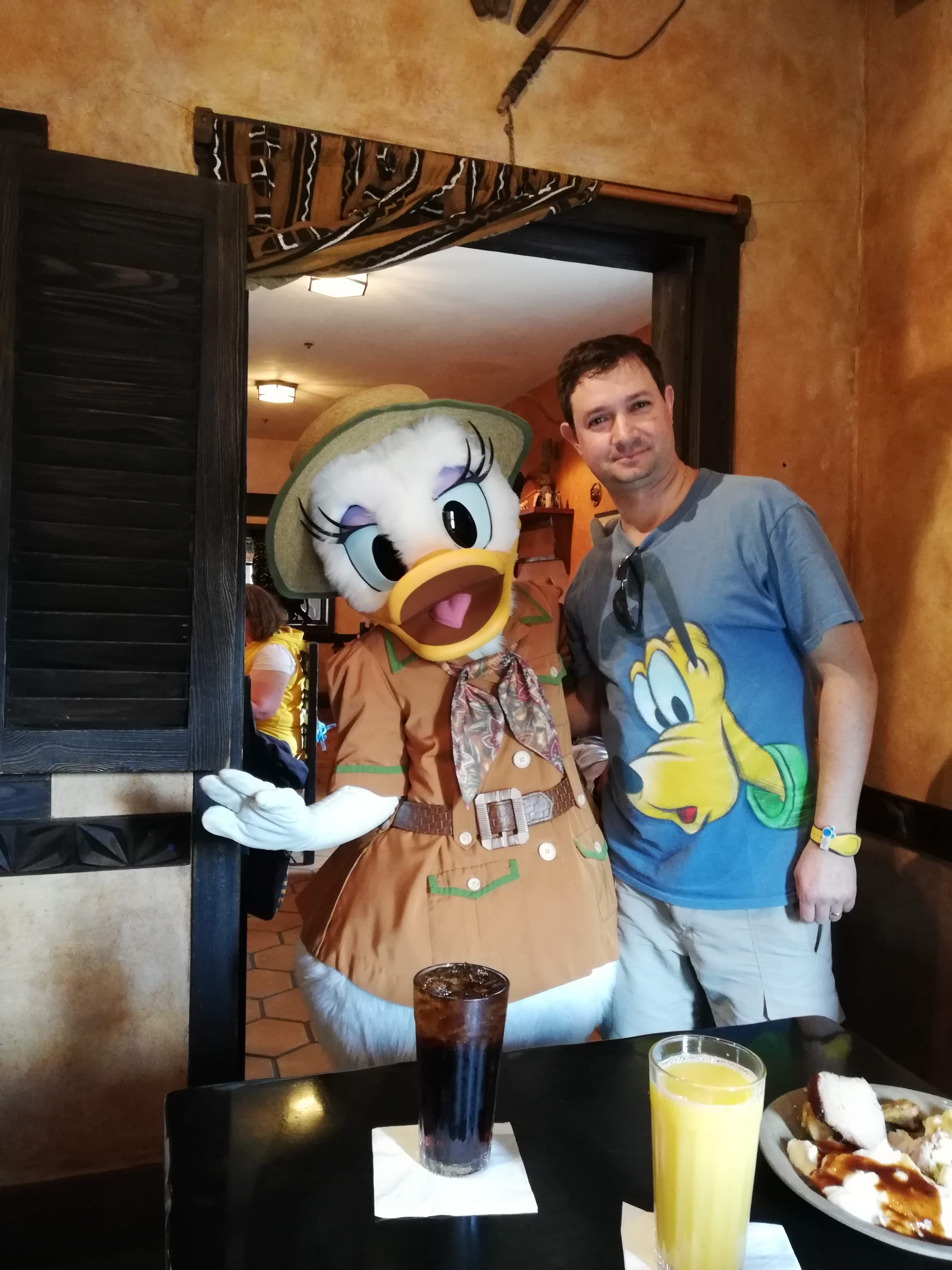 Advisor posing with Daisy Duck at Disney.