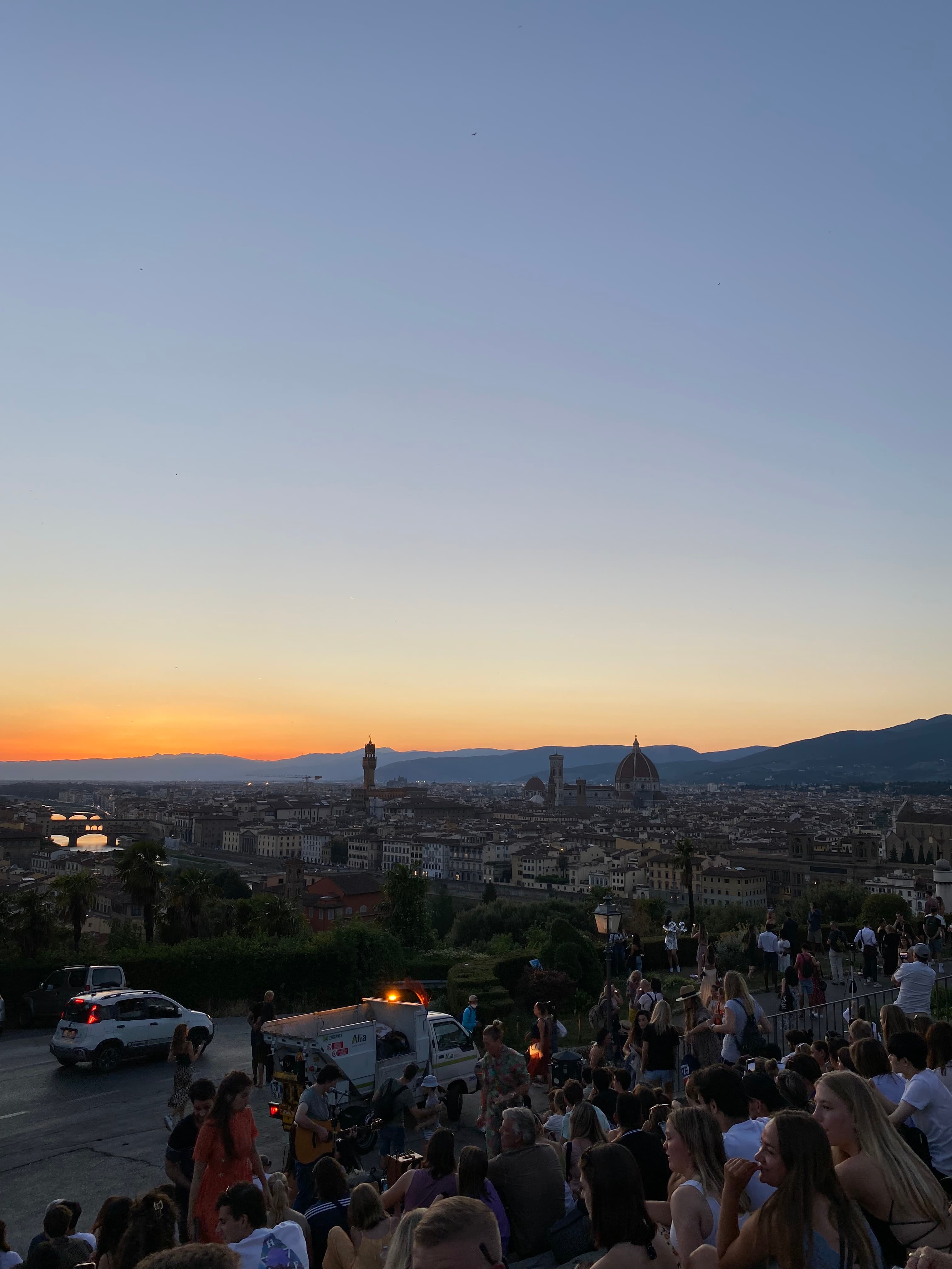 A view of a city at dusk.