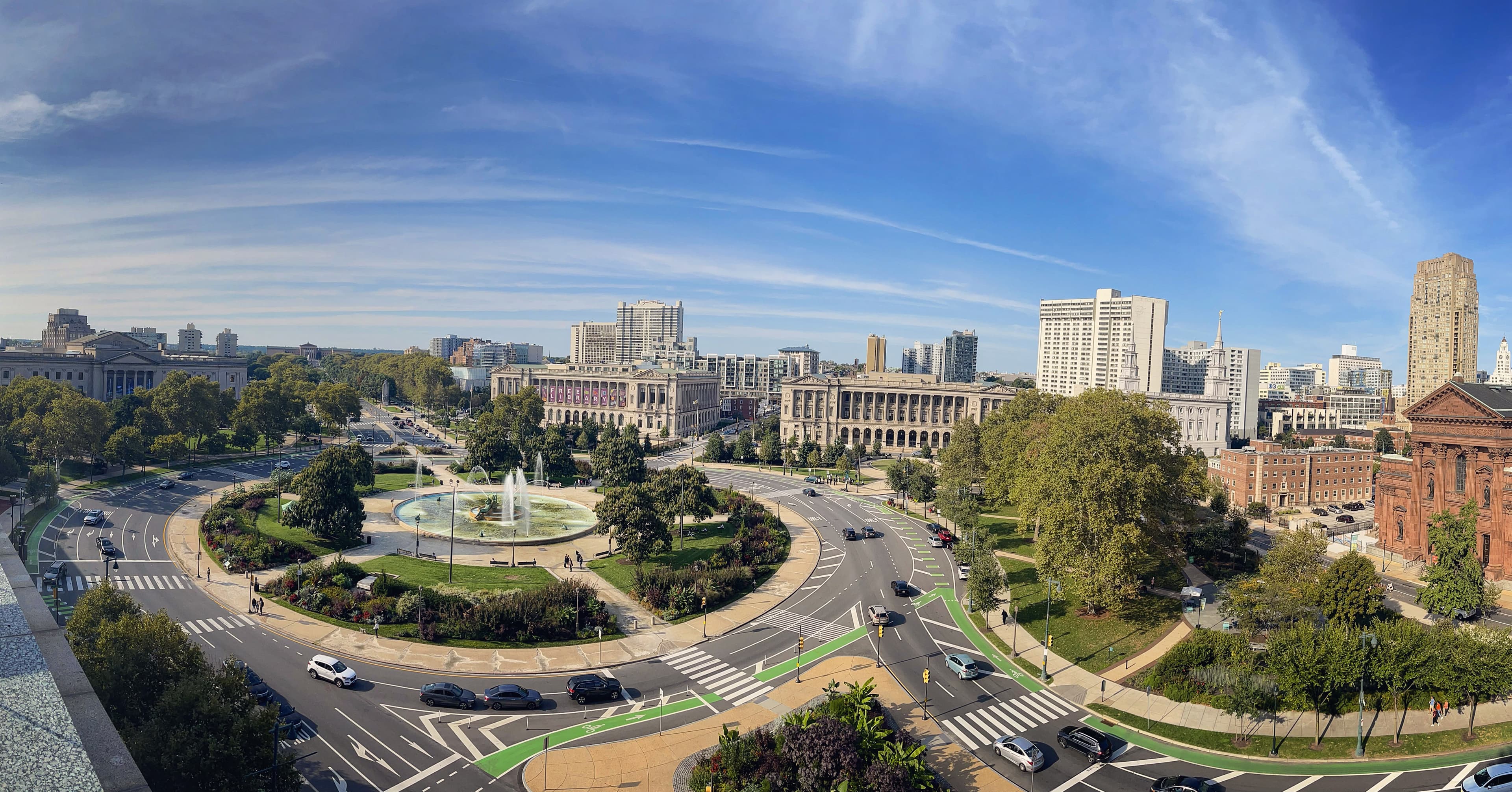 Logan Circle in Philadelphia as seen from above, a large circular roadway, under sunny skies