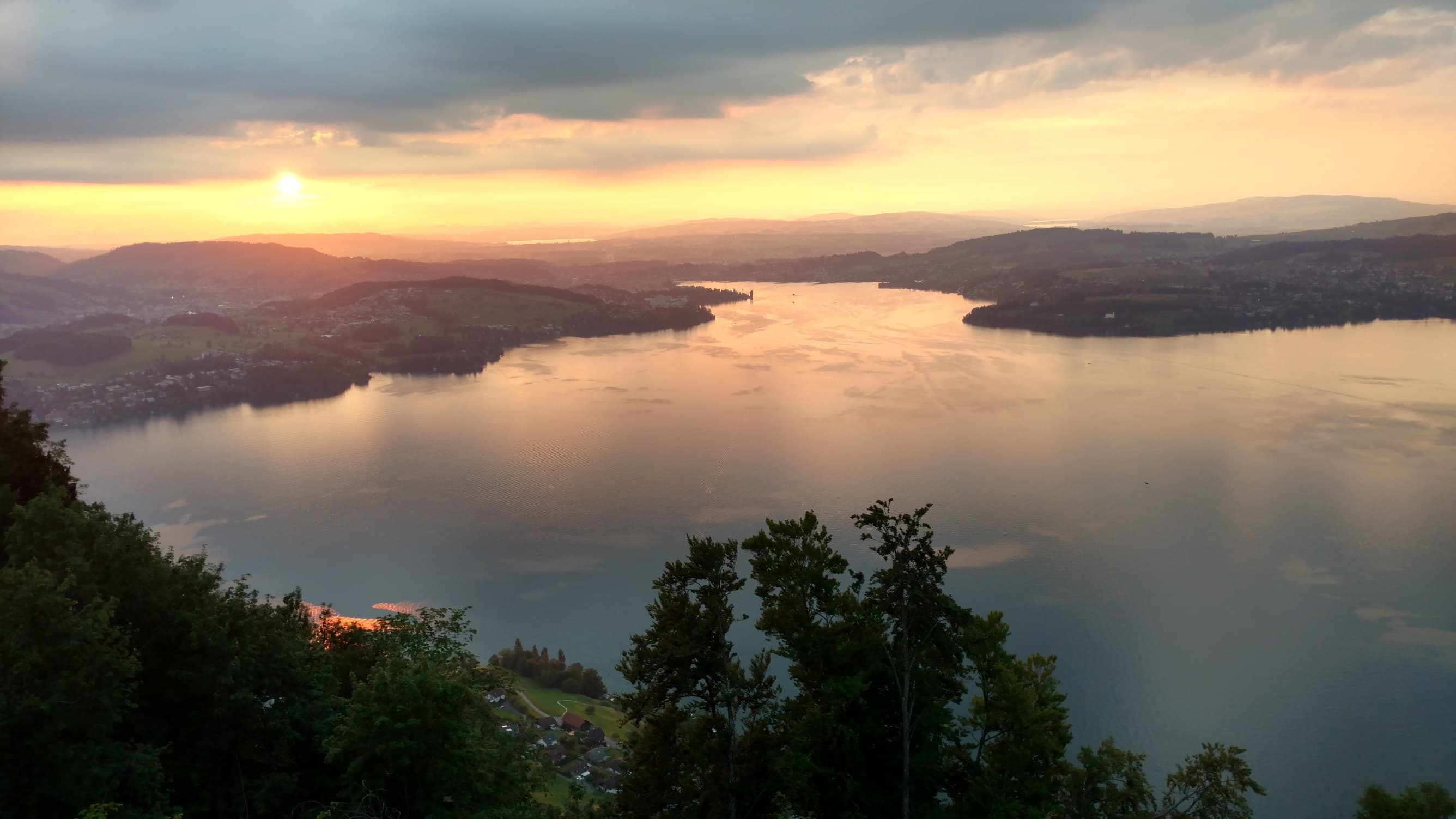 Scenic view of the lake at sunset.