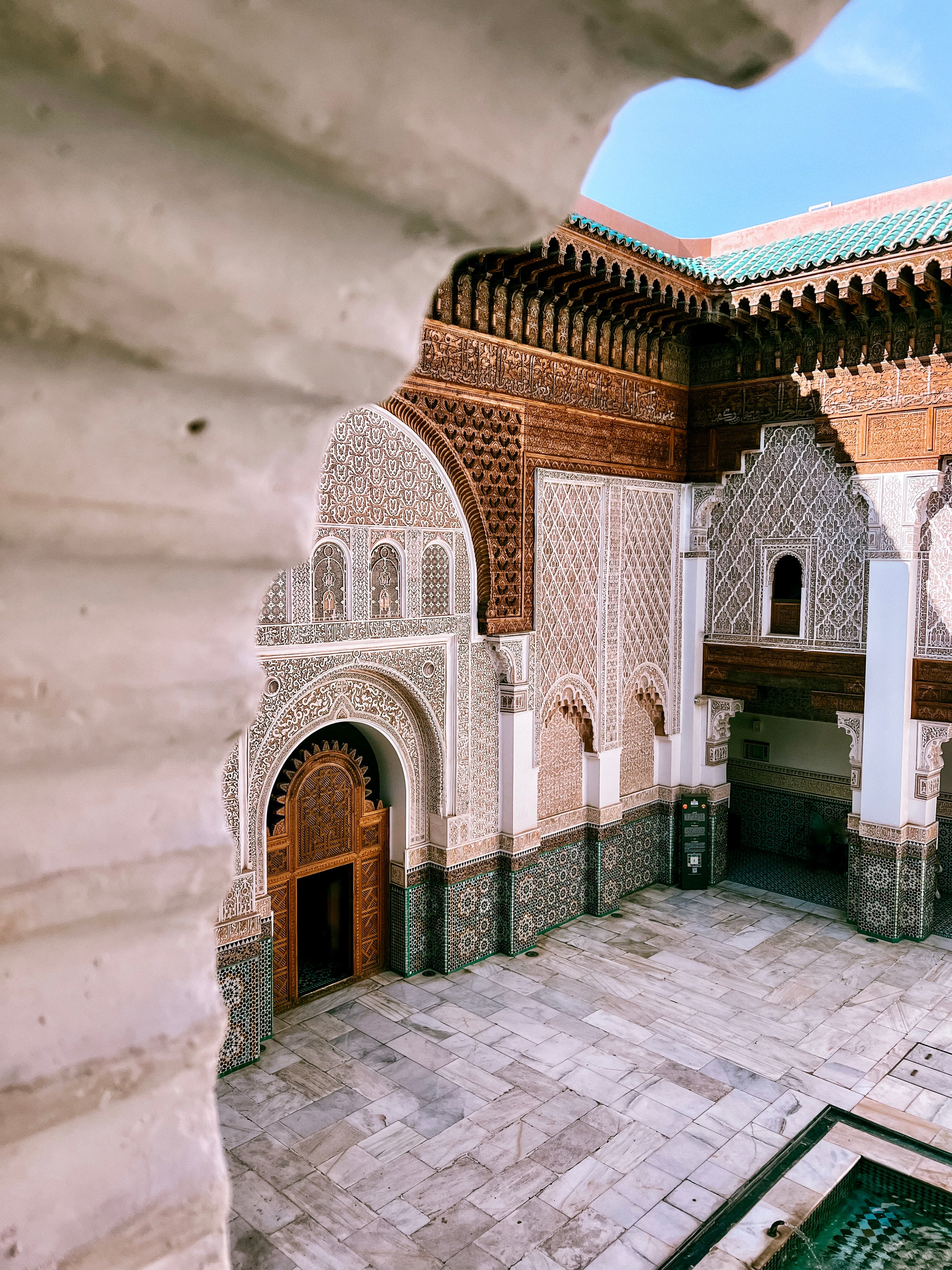 View of a beautiful interior courtyard with intricate decorations on a sunny day