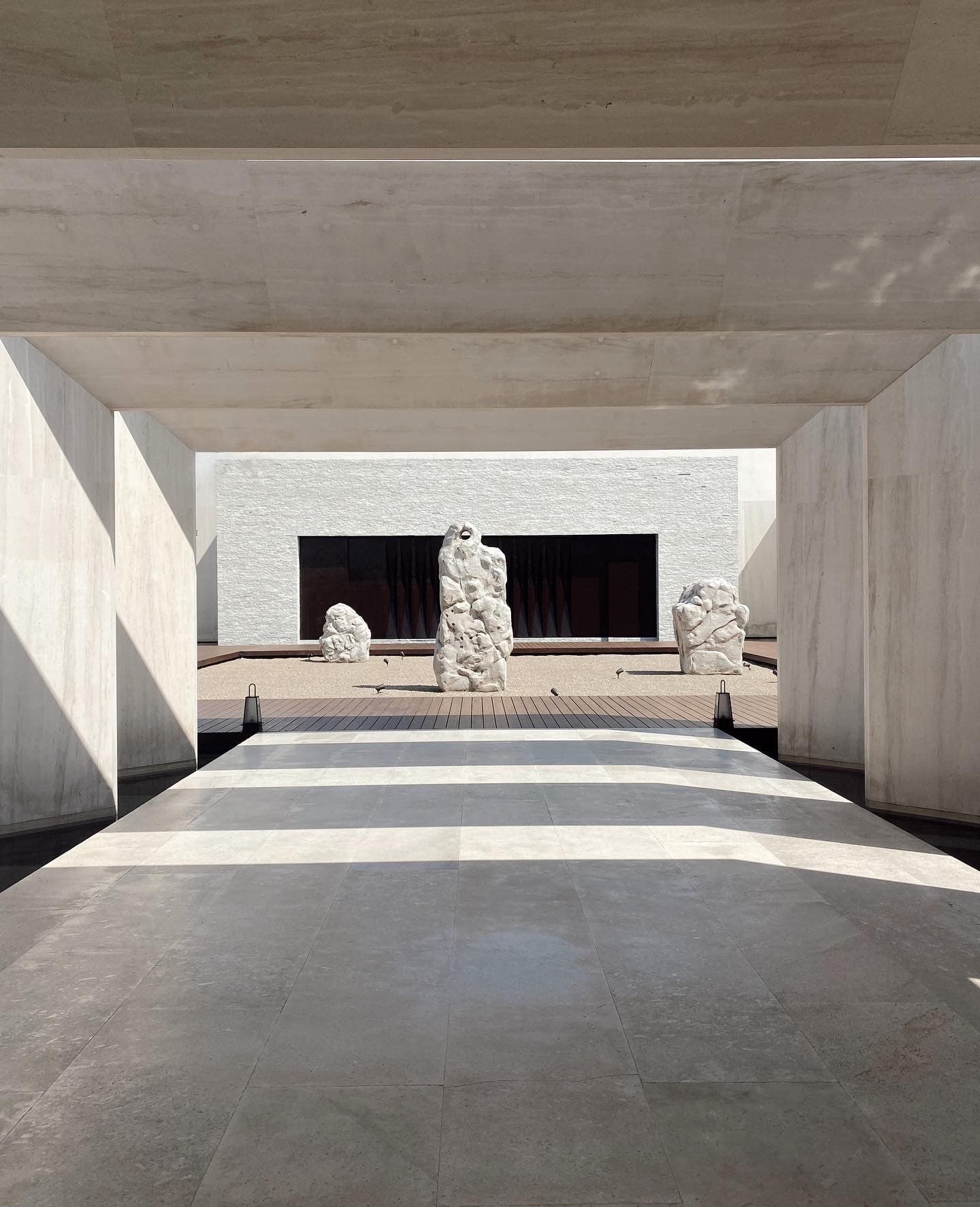 The entrance to a hotel during the daytime.