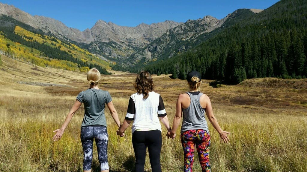 Friends looking out to the mountains.