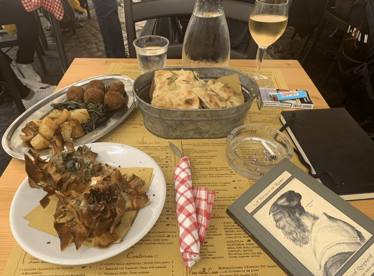 A table with food and wine. 