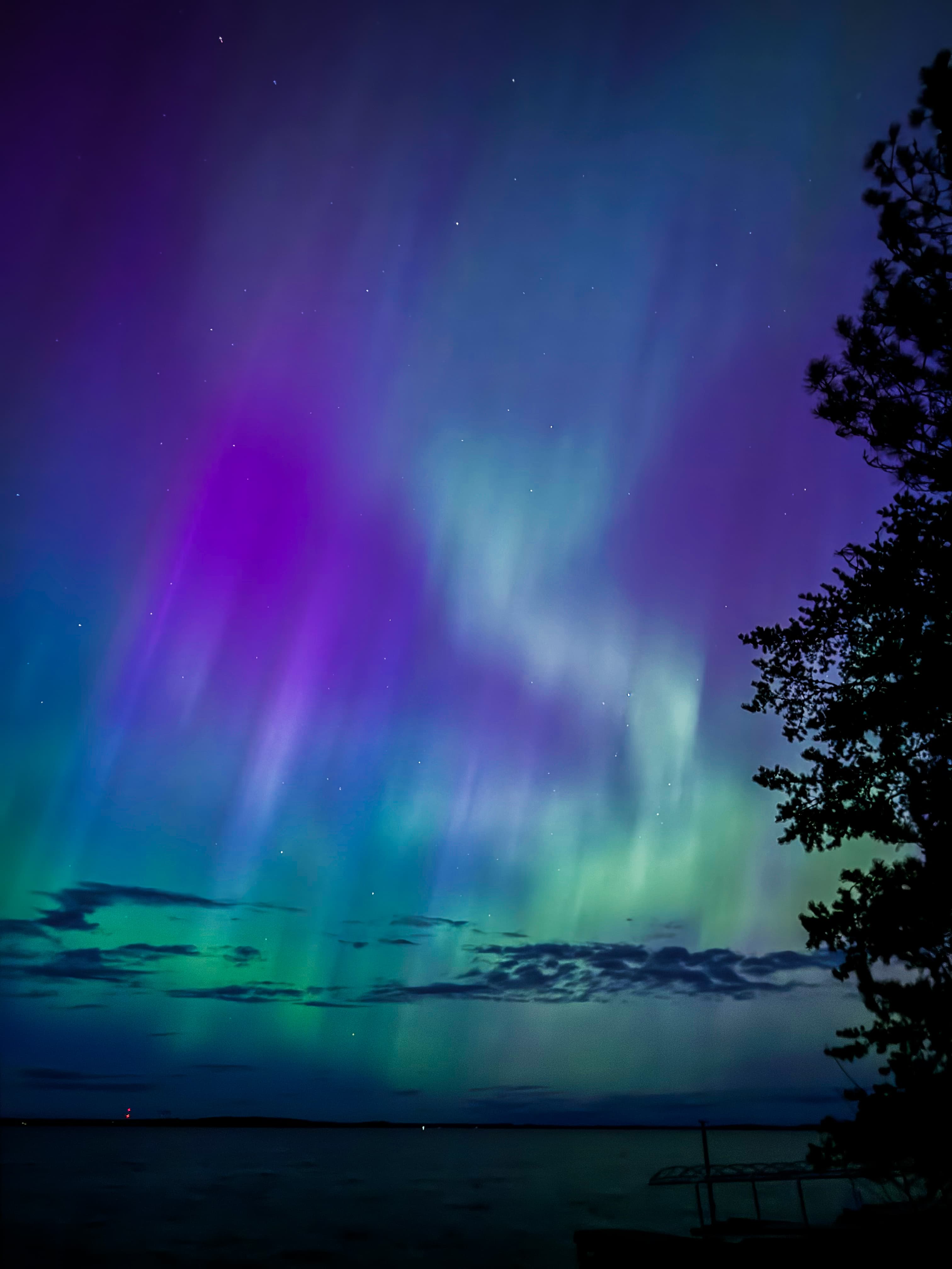 A view of the Norther Lights at nighttime. 