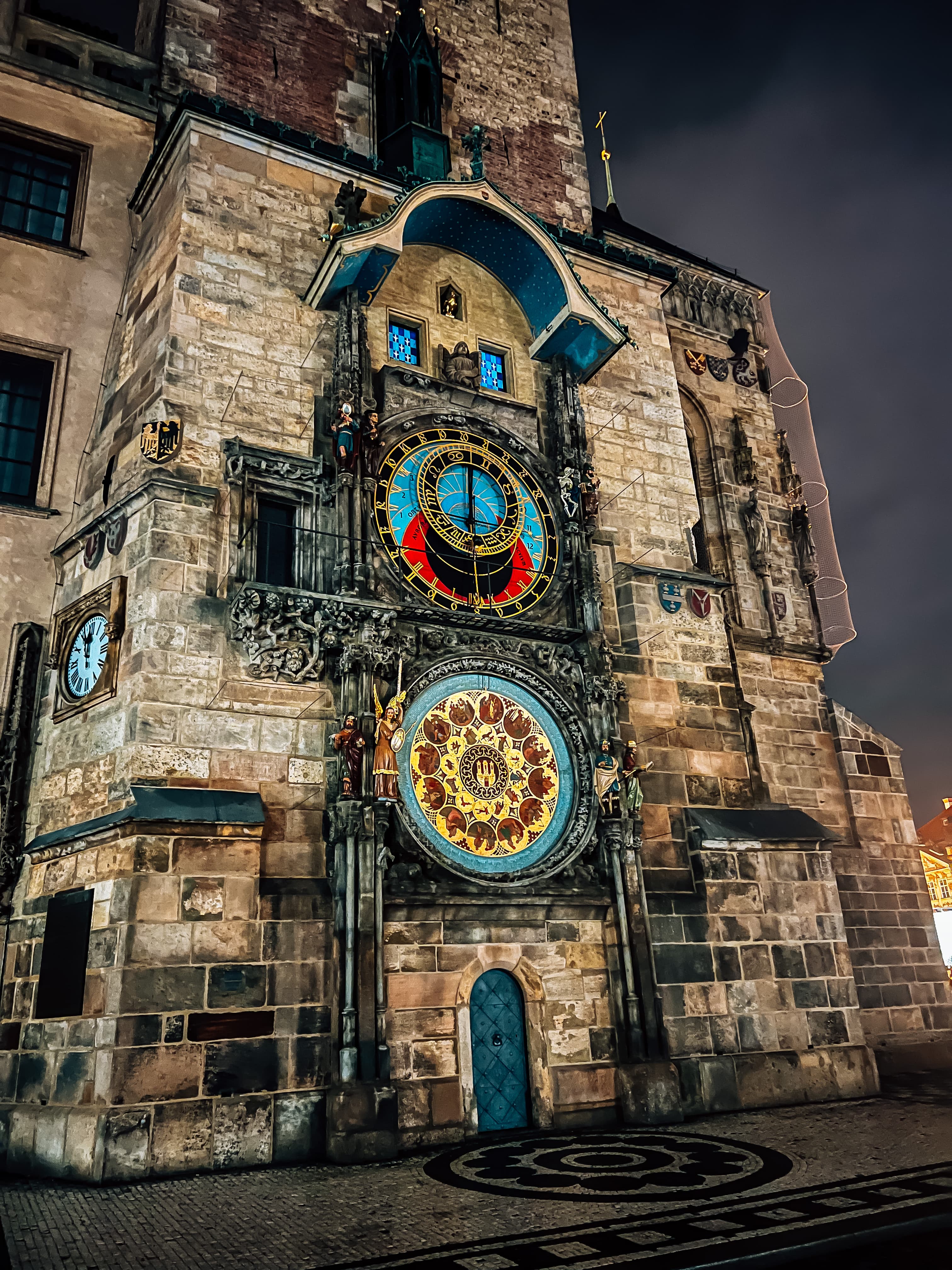 A view of an old building with colorful artwork.