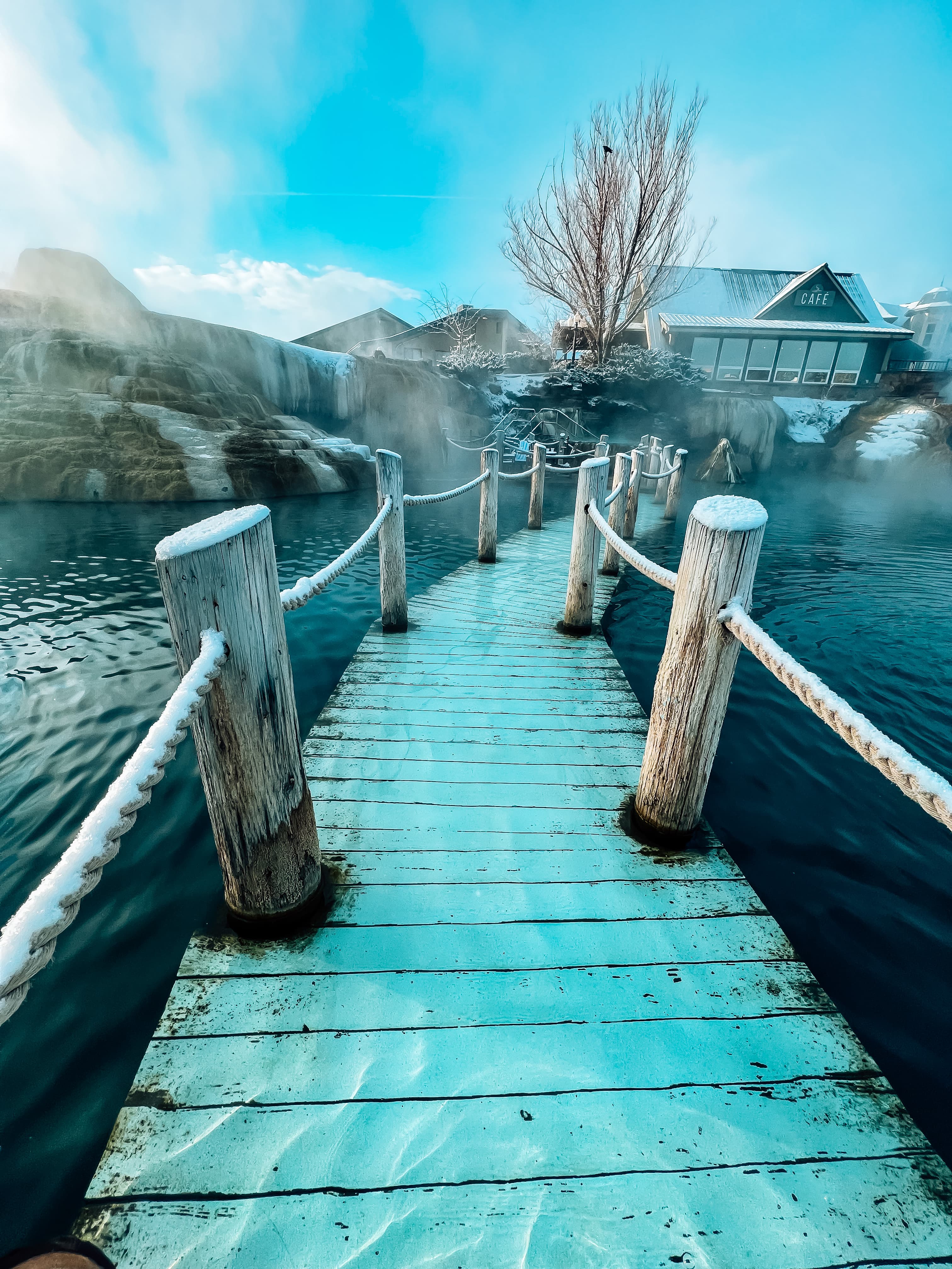 A path leading to the beach during the day. 