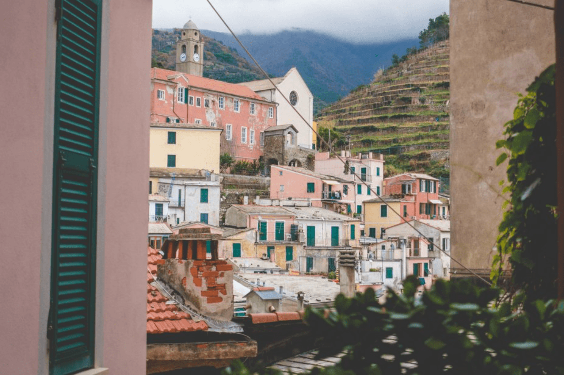 Colorful buildings over the hill.