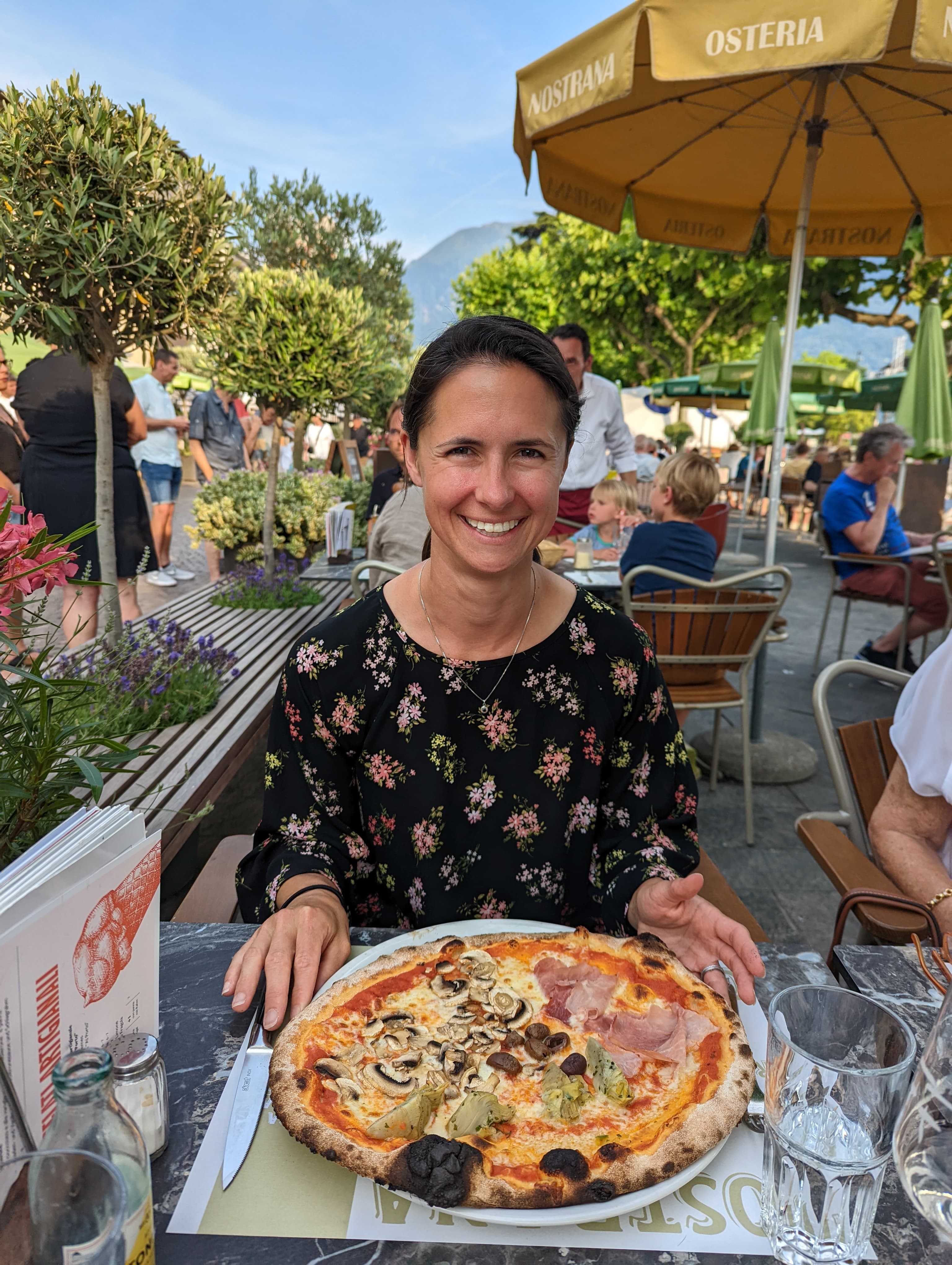 Eating pizza in the sun.