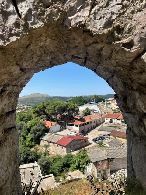 Town through an archway.