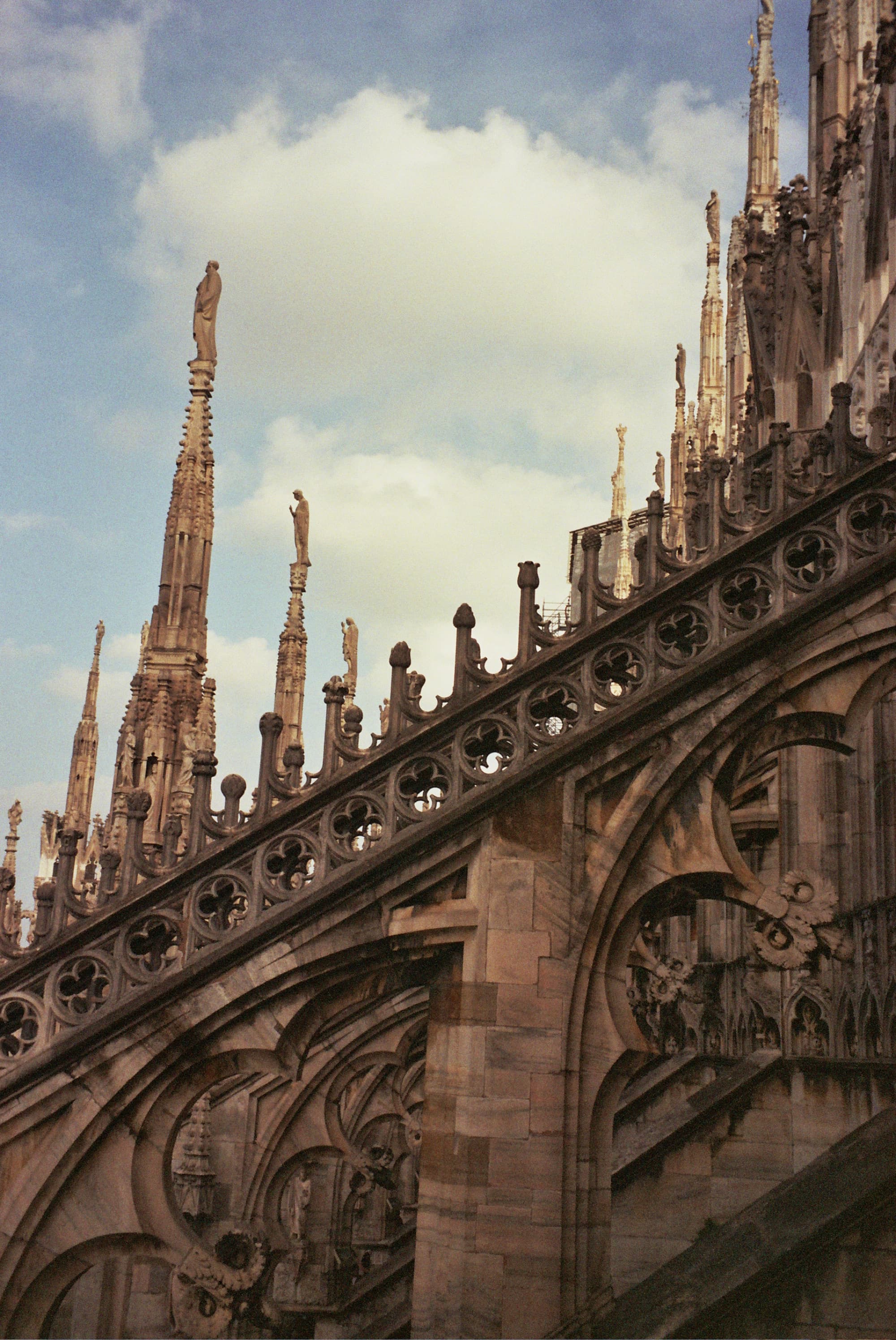 Close up view of spires on a cathedral during a sunny afternoon