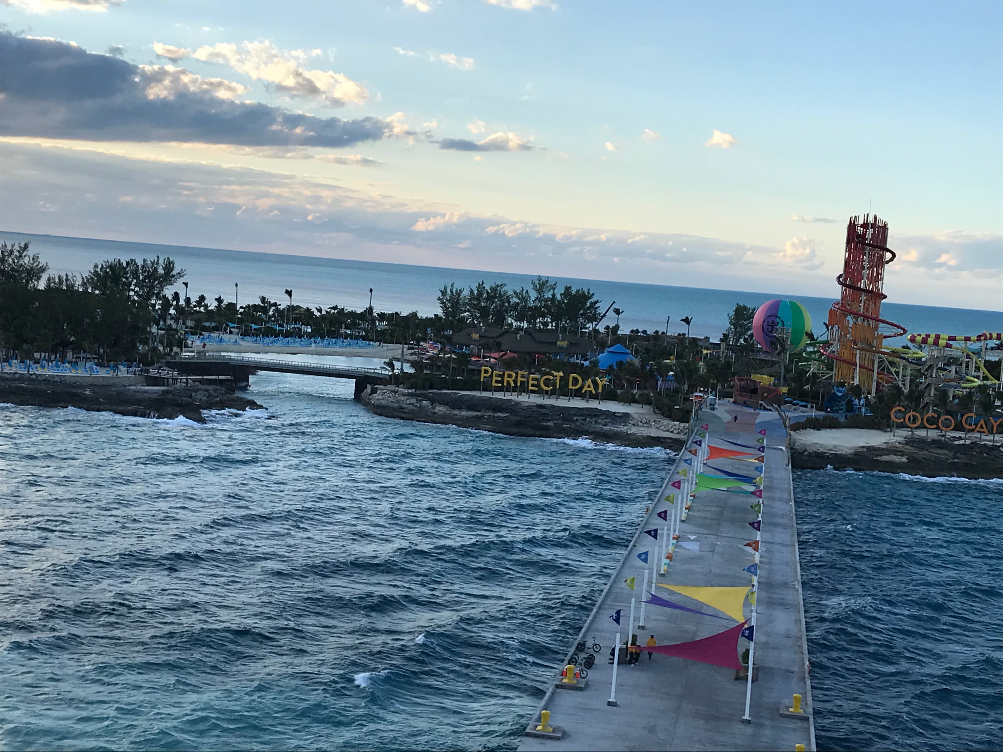 The ocean during the daytime with buildings around it.