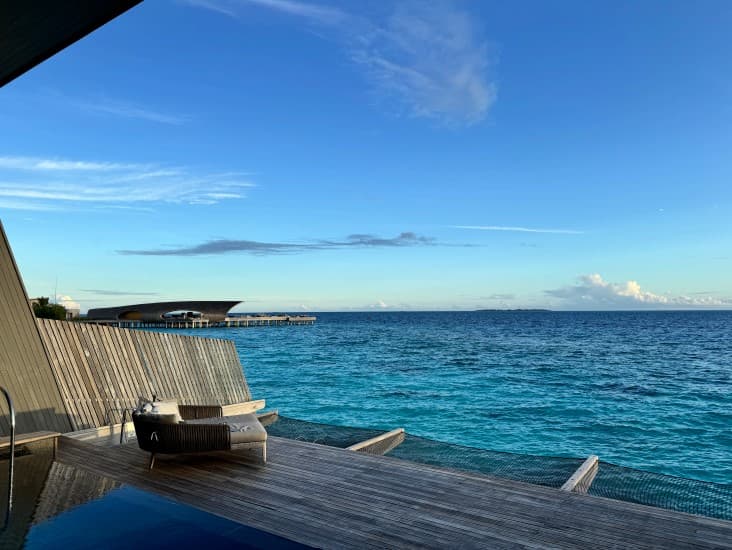 View of a calm sea under clear skies in the Maldives