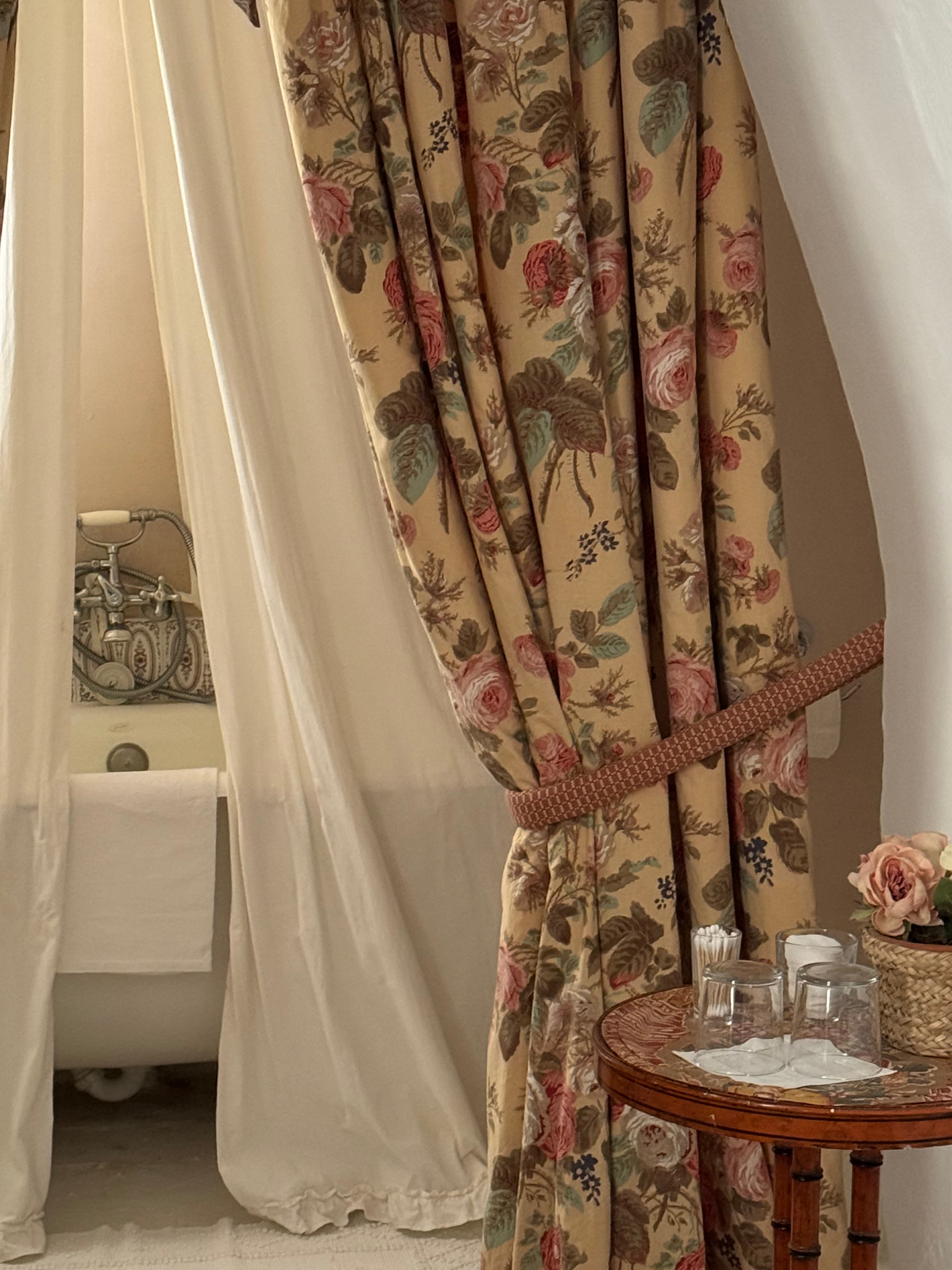 Curtain over bath.
