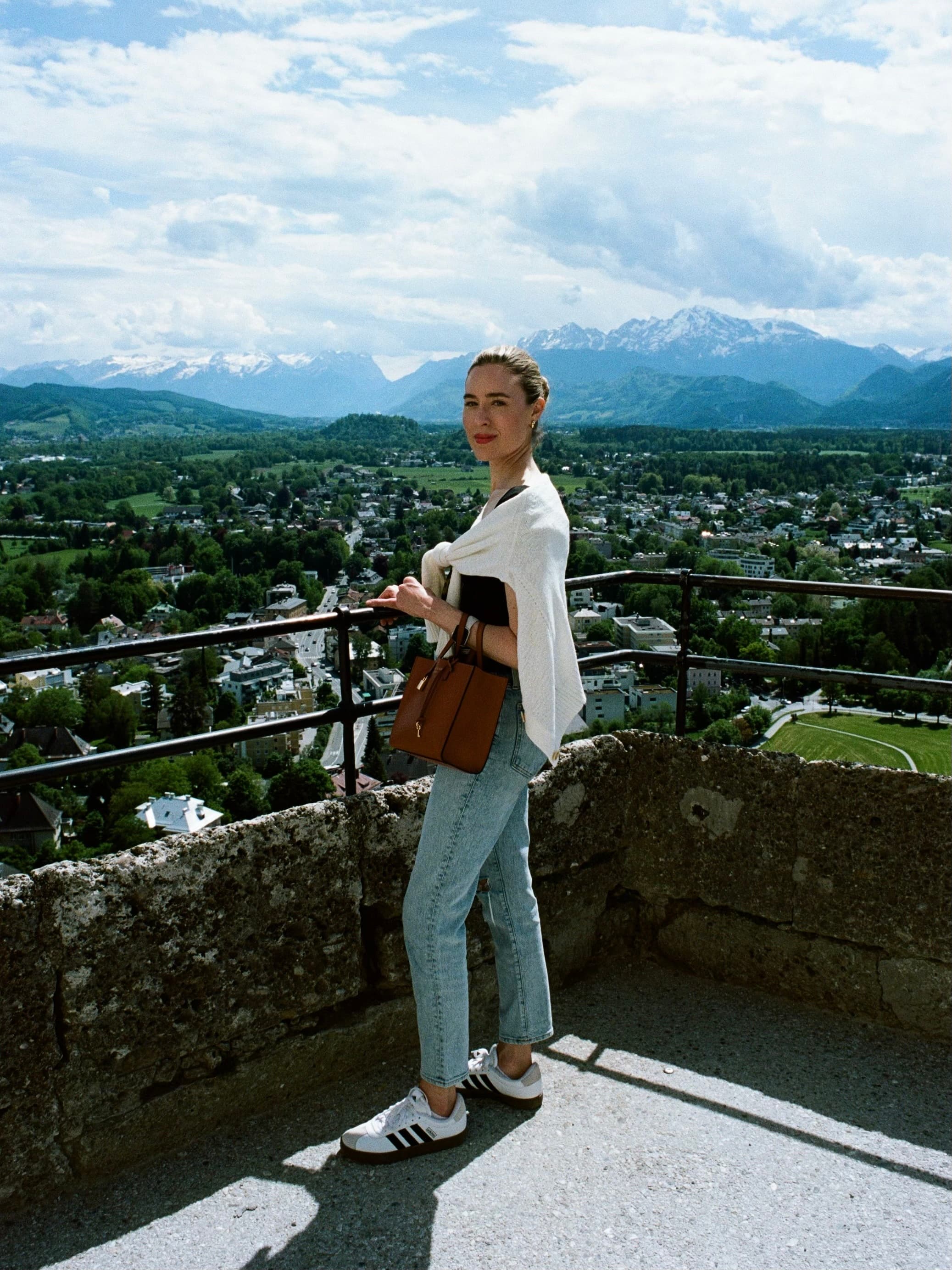 Advisor standing on a rooftop in Salzburg, Austria on a sunny day
