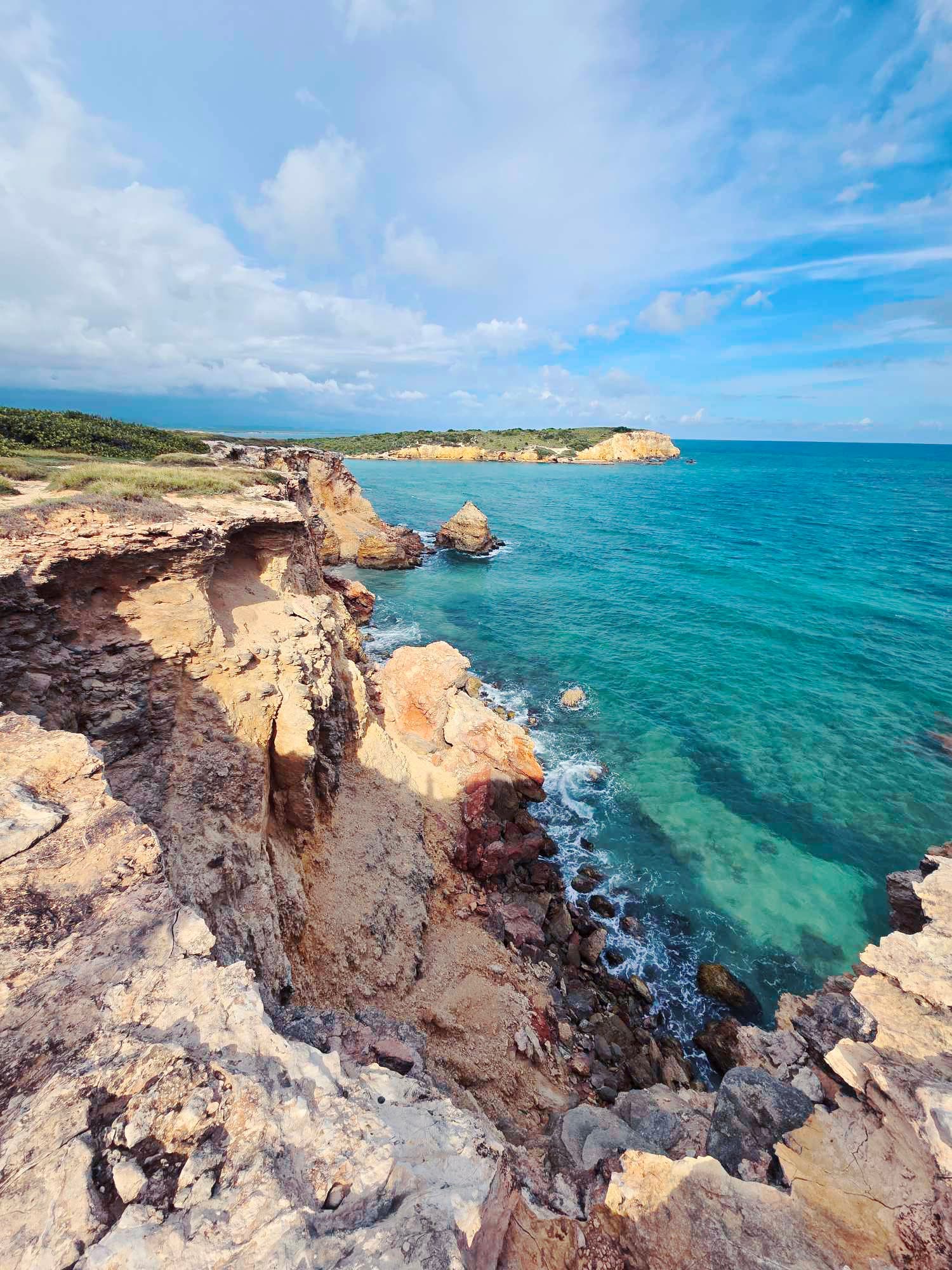 Blue sea by the cliffs.