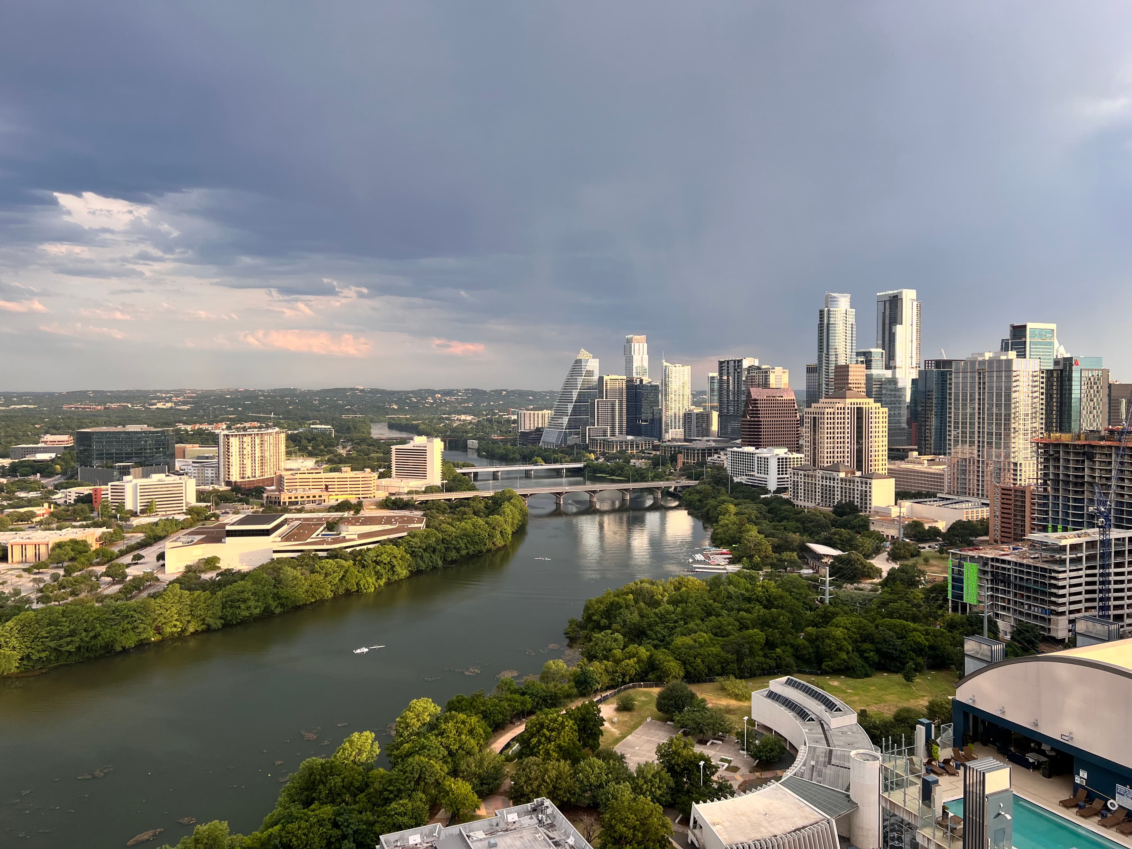 City skyline by a lake.