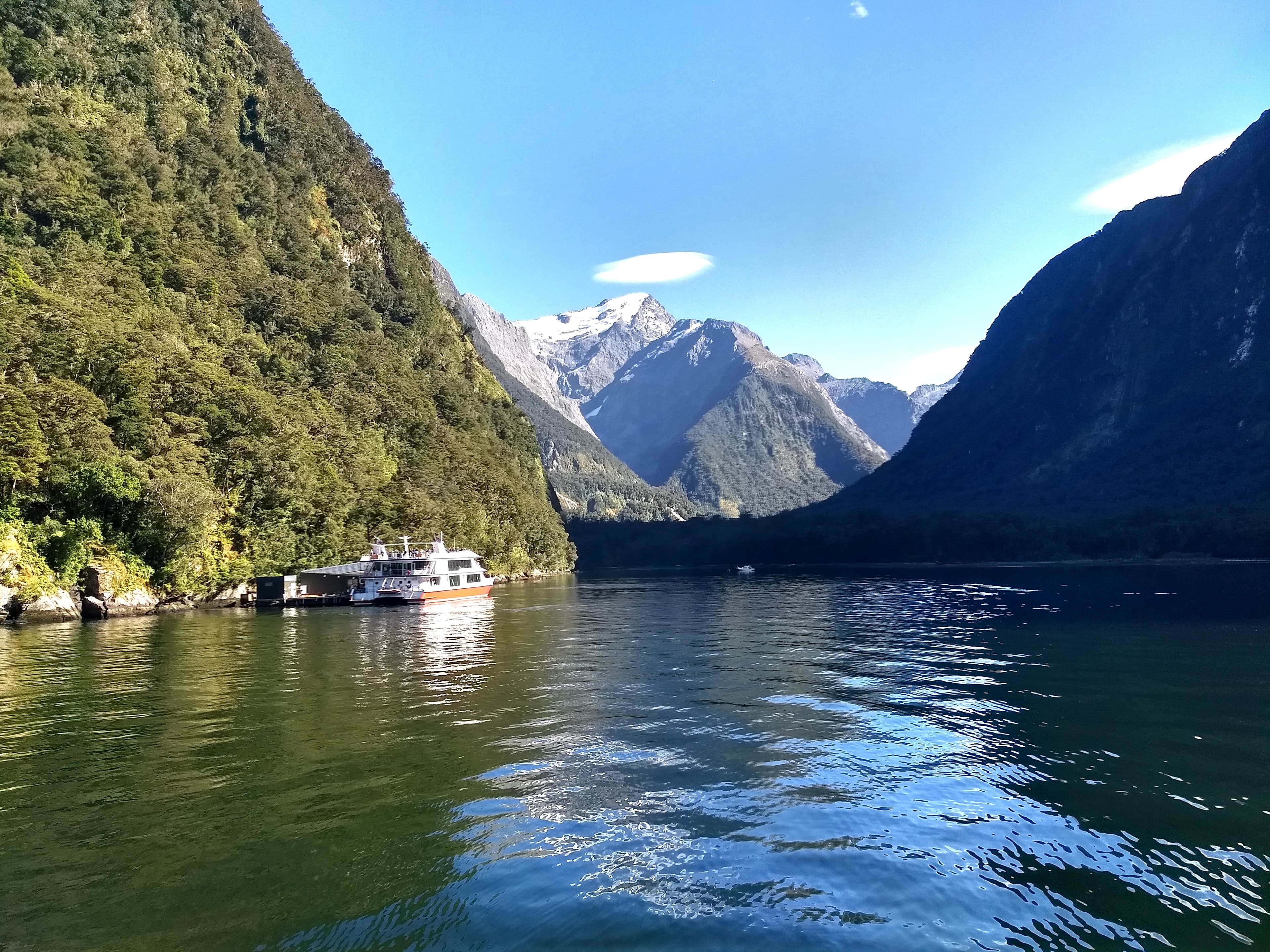 View of the water and mountains during the daytime.
