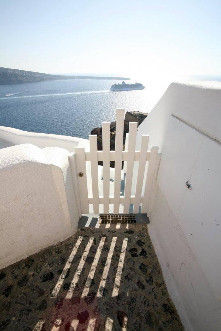 View of a gate on a boat on the ocean during the daytime.