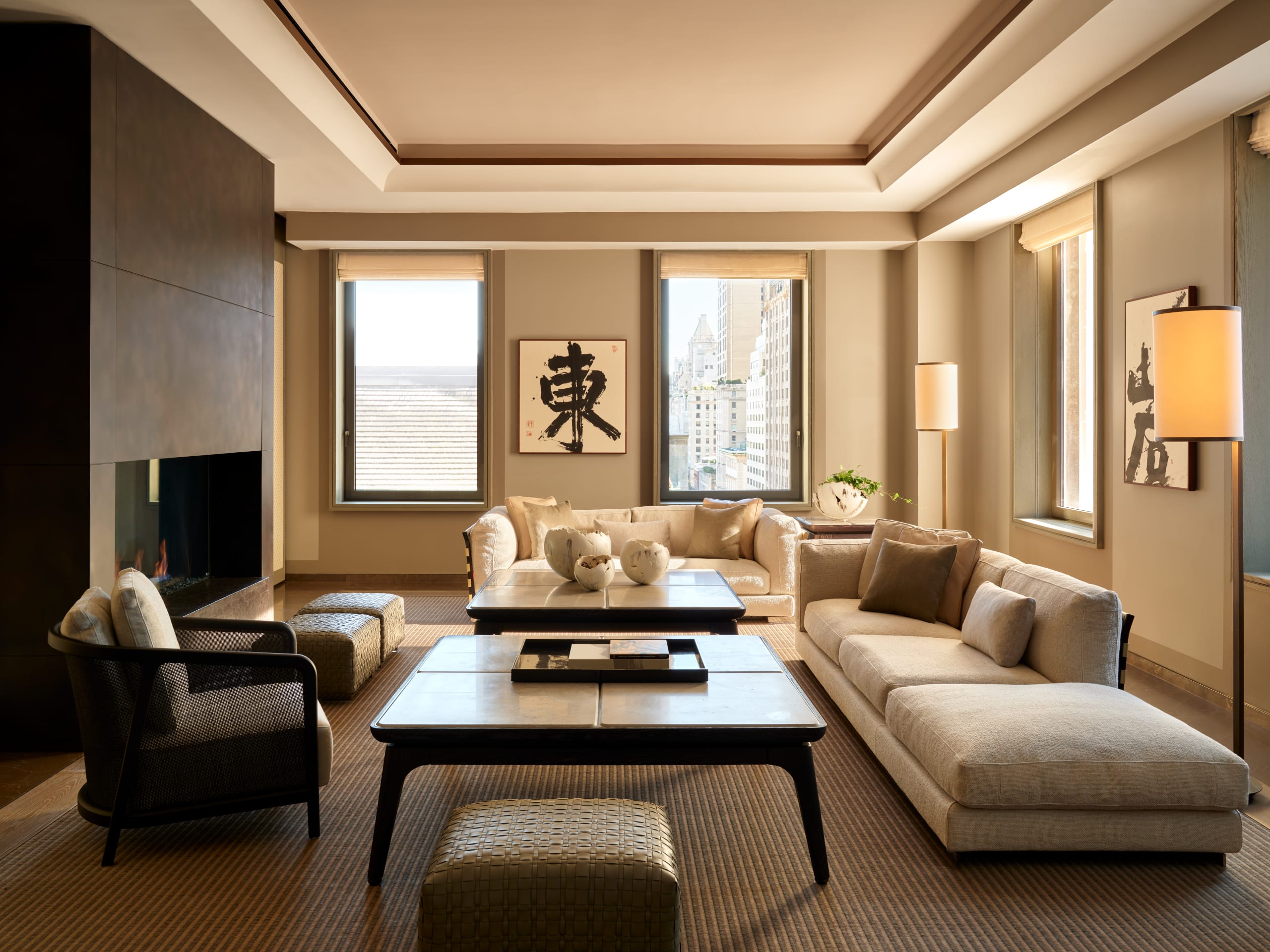 An elegant hotel living room with cream and neutral furnishings