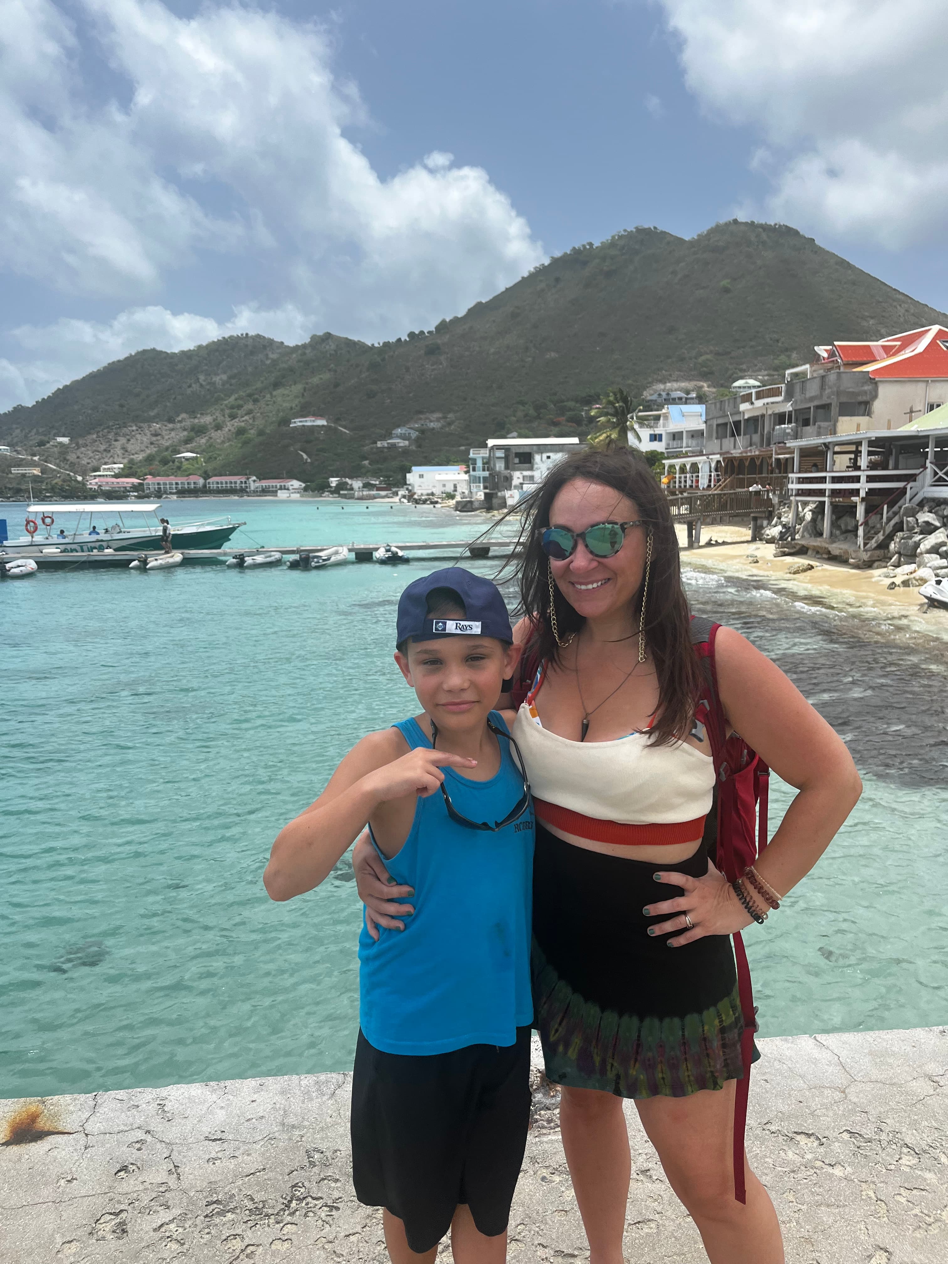 sheila with a boy on harbor