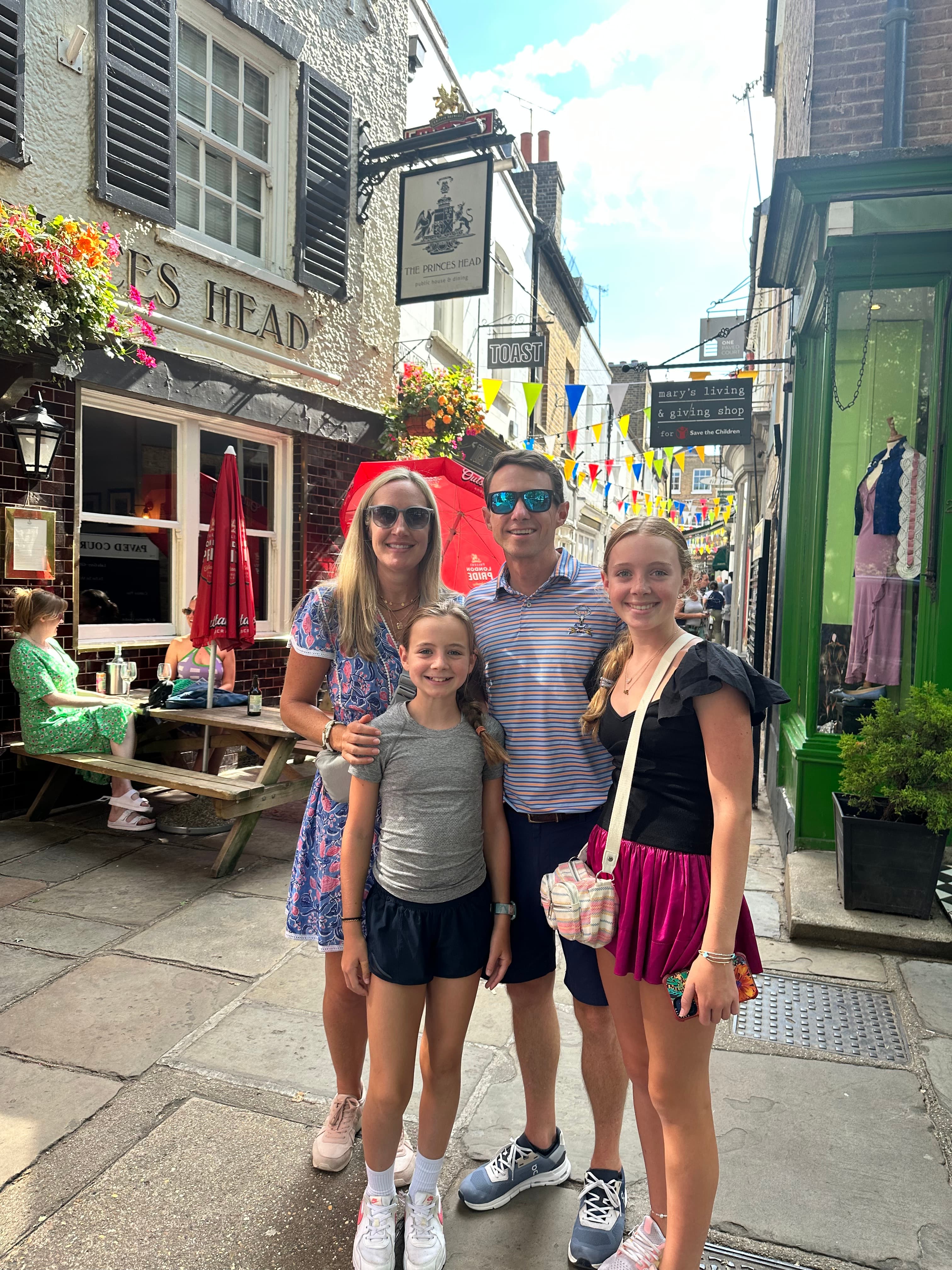 Posing for a family photo on the street