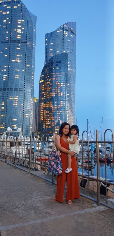 Travel advisor posing on bridge