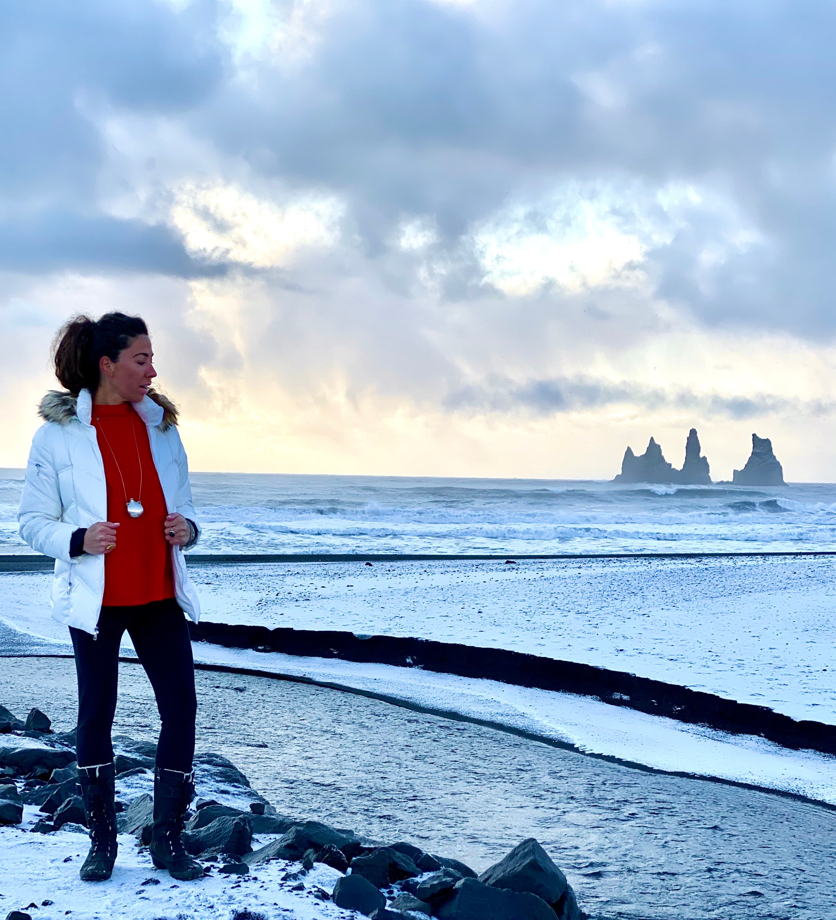 Travel advisor posing on beachside
