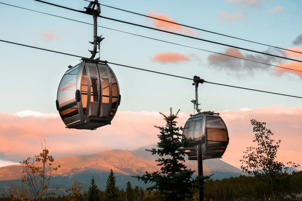 A sunset shot of two gondolas in Steamboat.