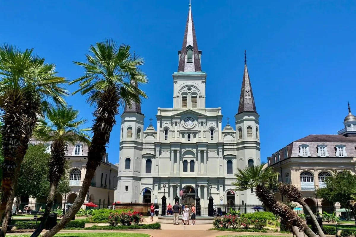 Palm trees, manicured gardens and clean paths mark Jackson Square in New Orleans' French Quarter