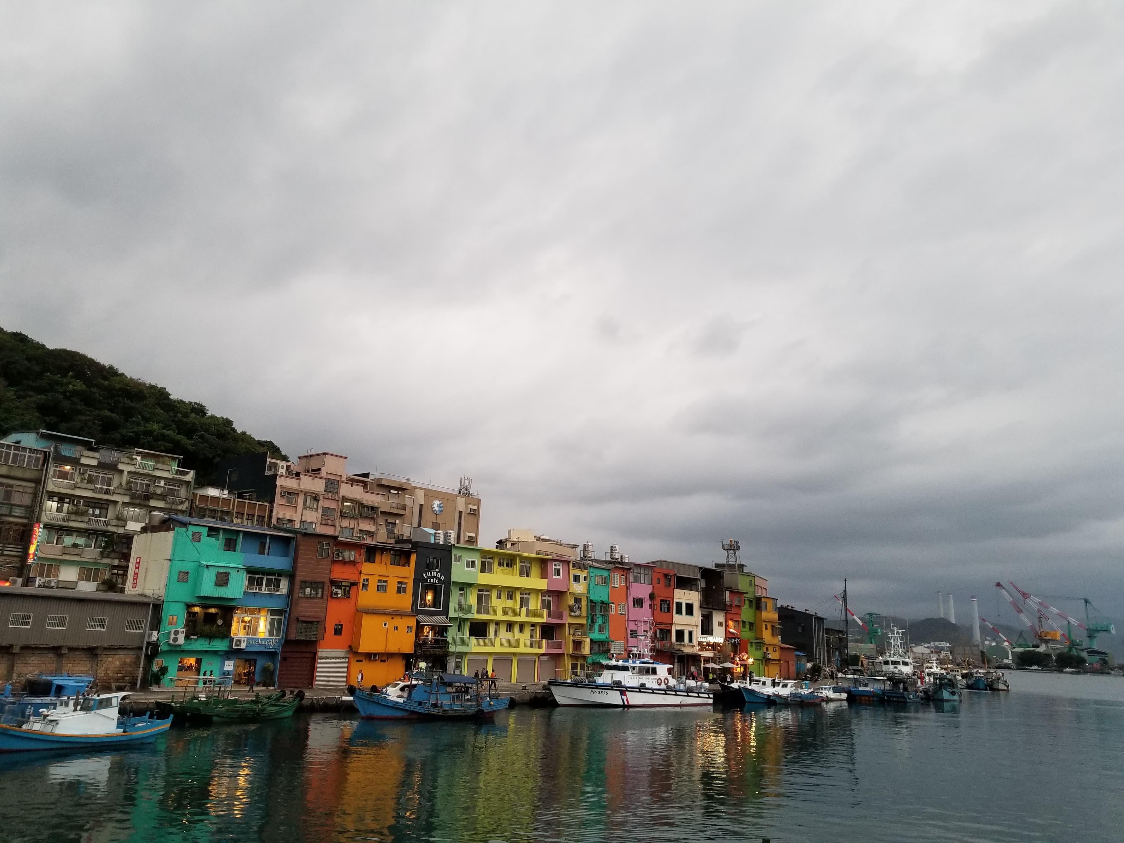 colorful buildings by river