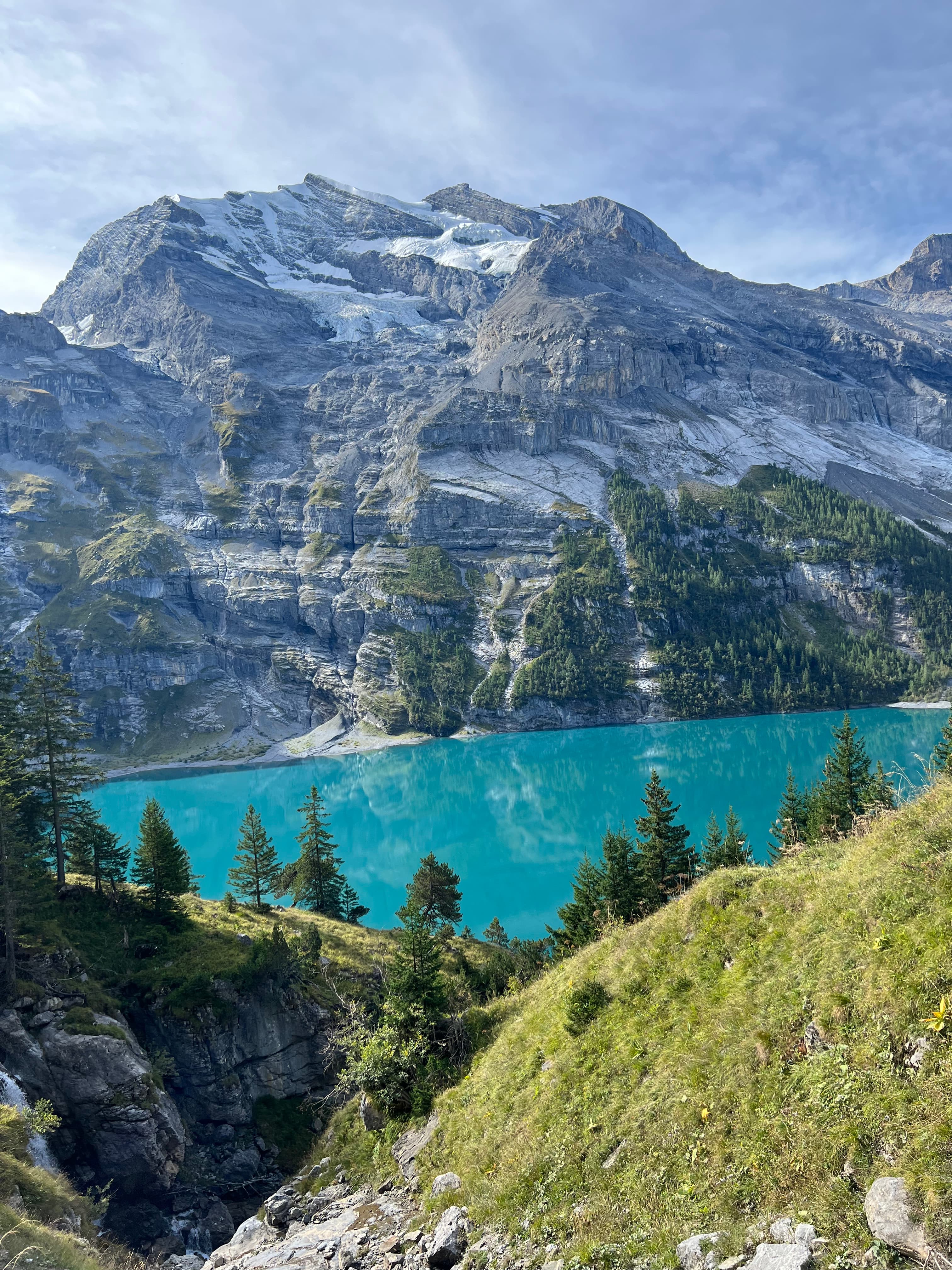 lake side by mountains