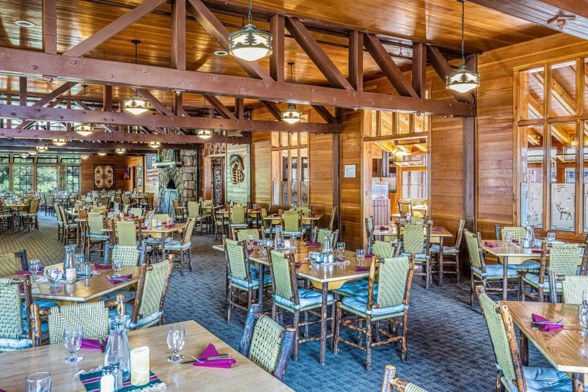 An indoor dining room in a wooden building