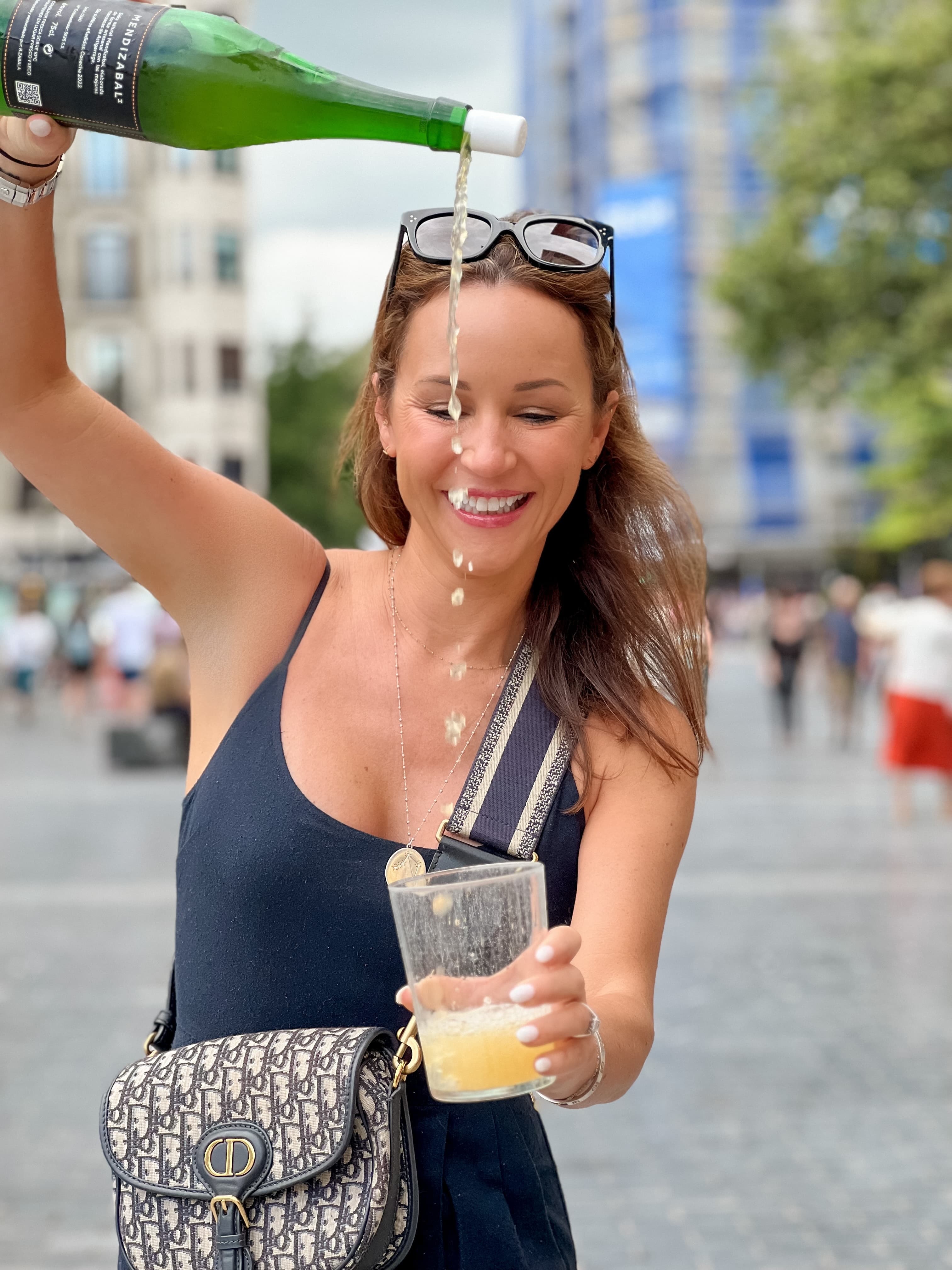 Travel advisor poring drink