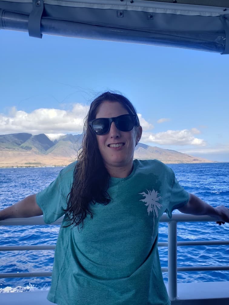 Travel advisor posing on a cruise