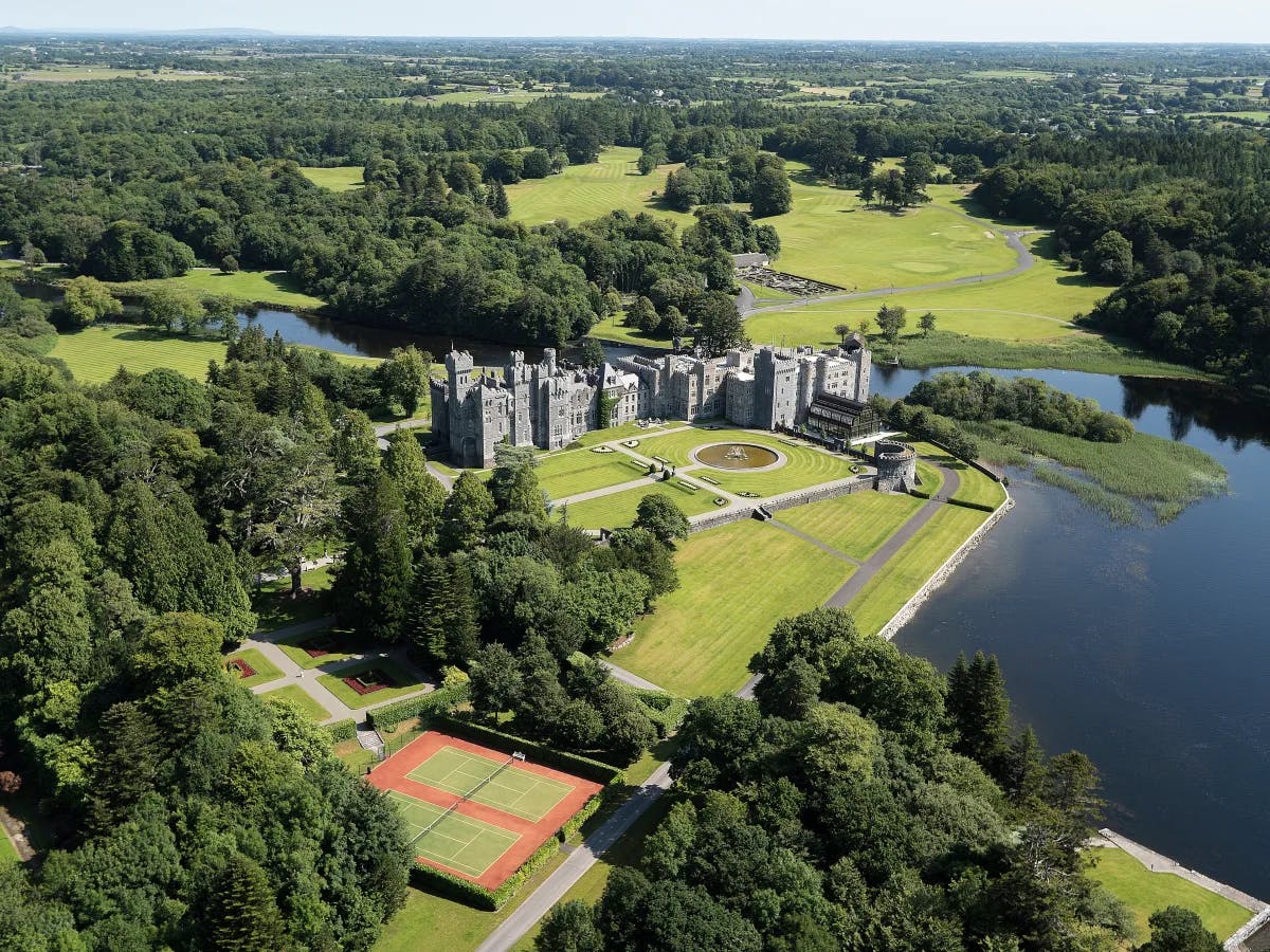 An aerial view of the Ashford Castle during the daytime.