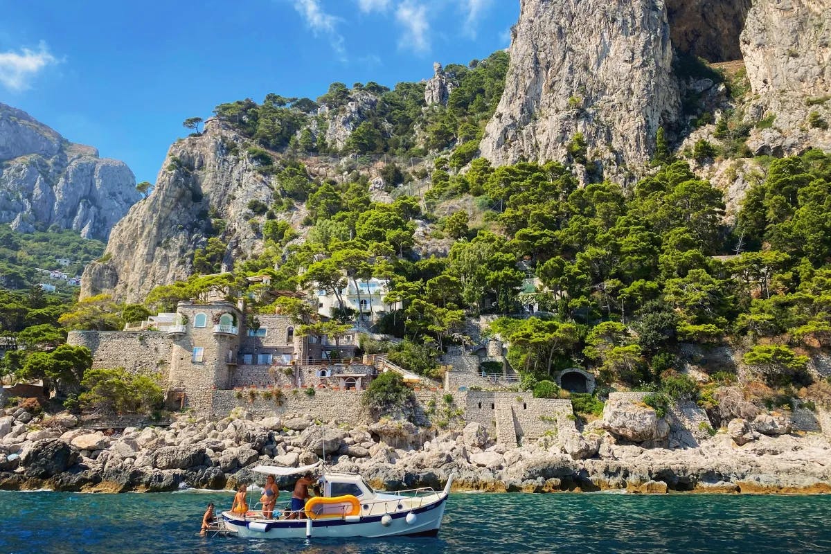 Hire a private boat and sail to the beautiful island of Capri.
