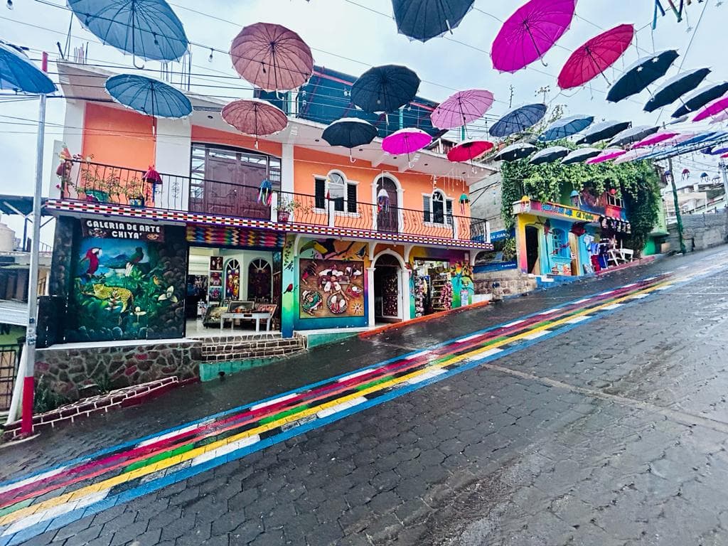 A beautiful view of street with umbrellas