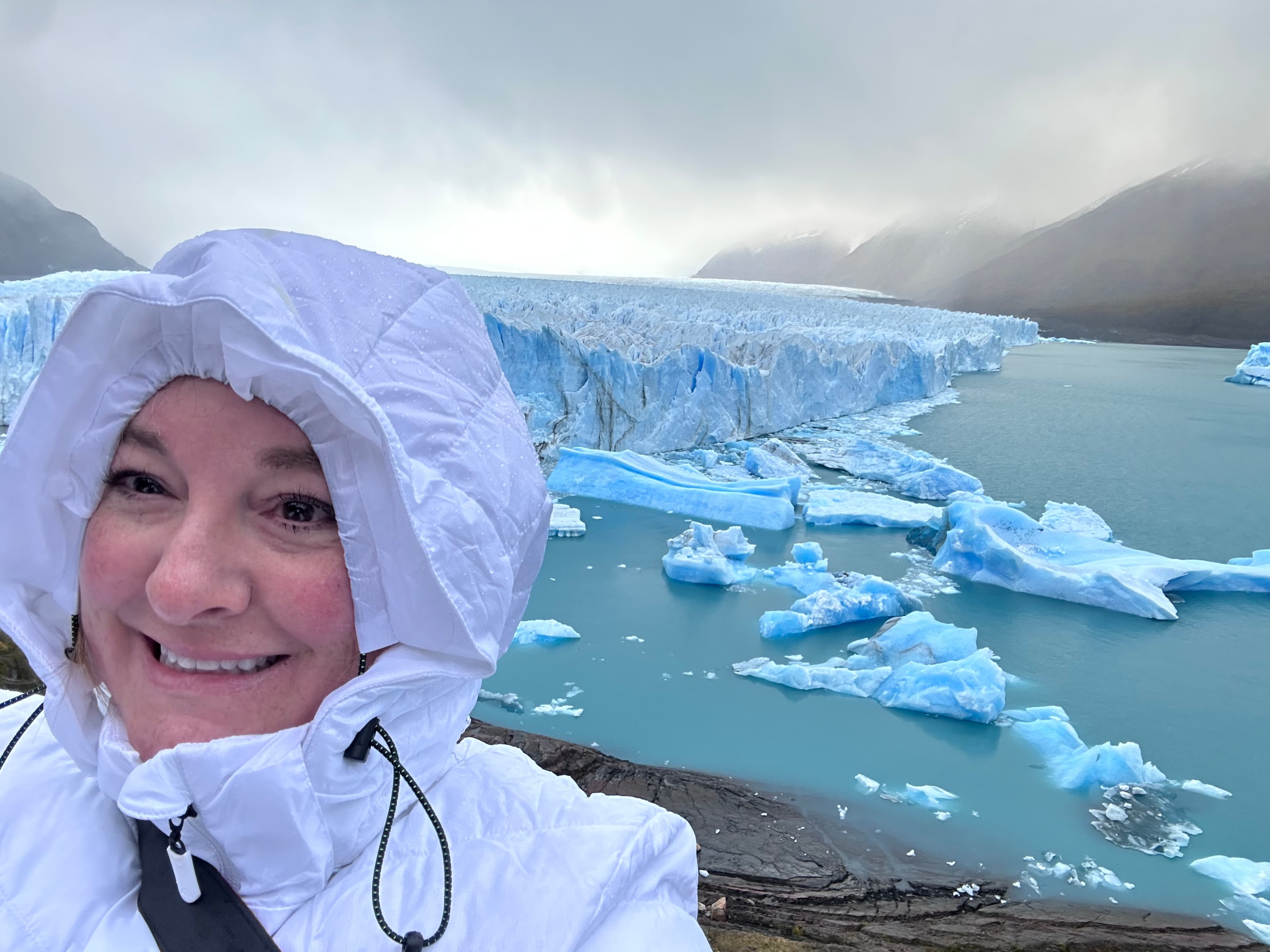 Travel advisor posing in a snowy region