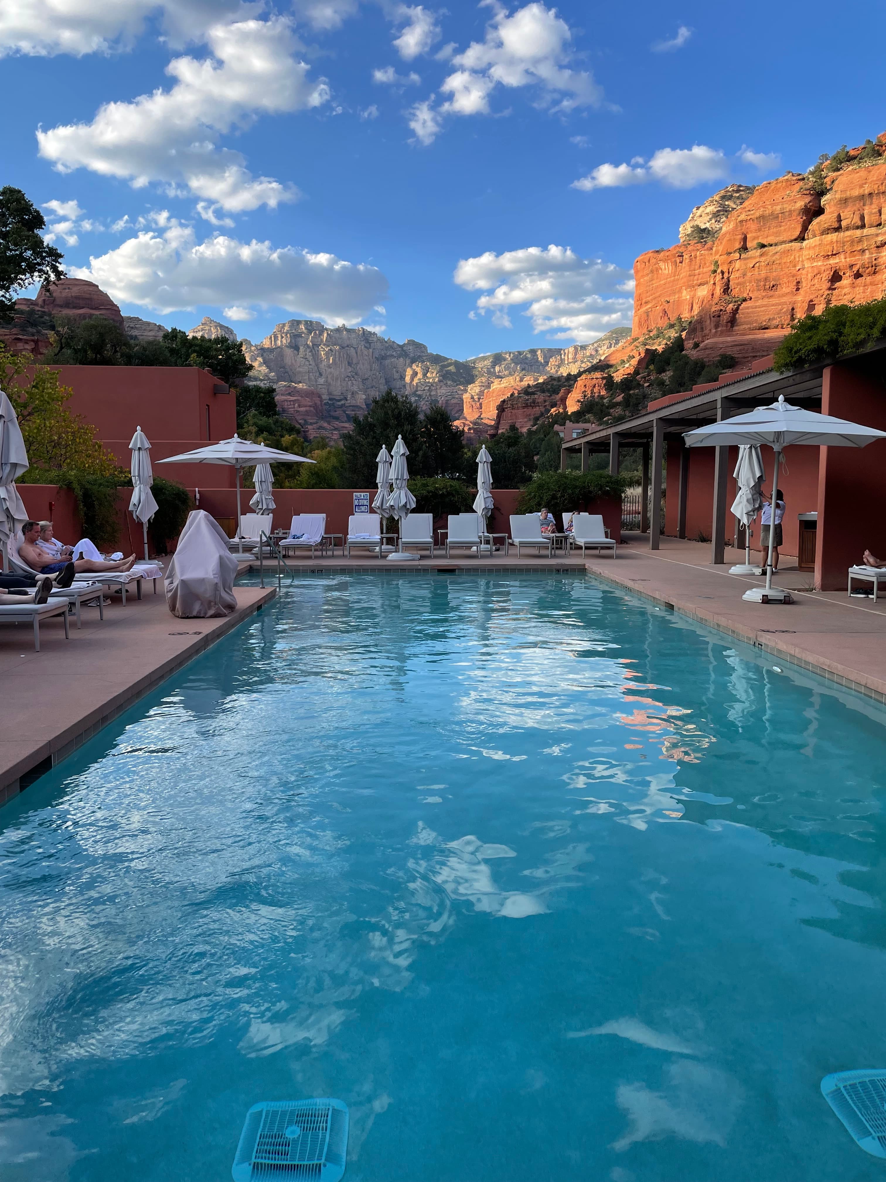 A beautiful shot of the pool with red mountains
